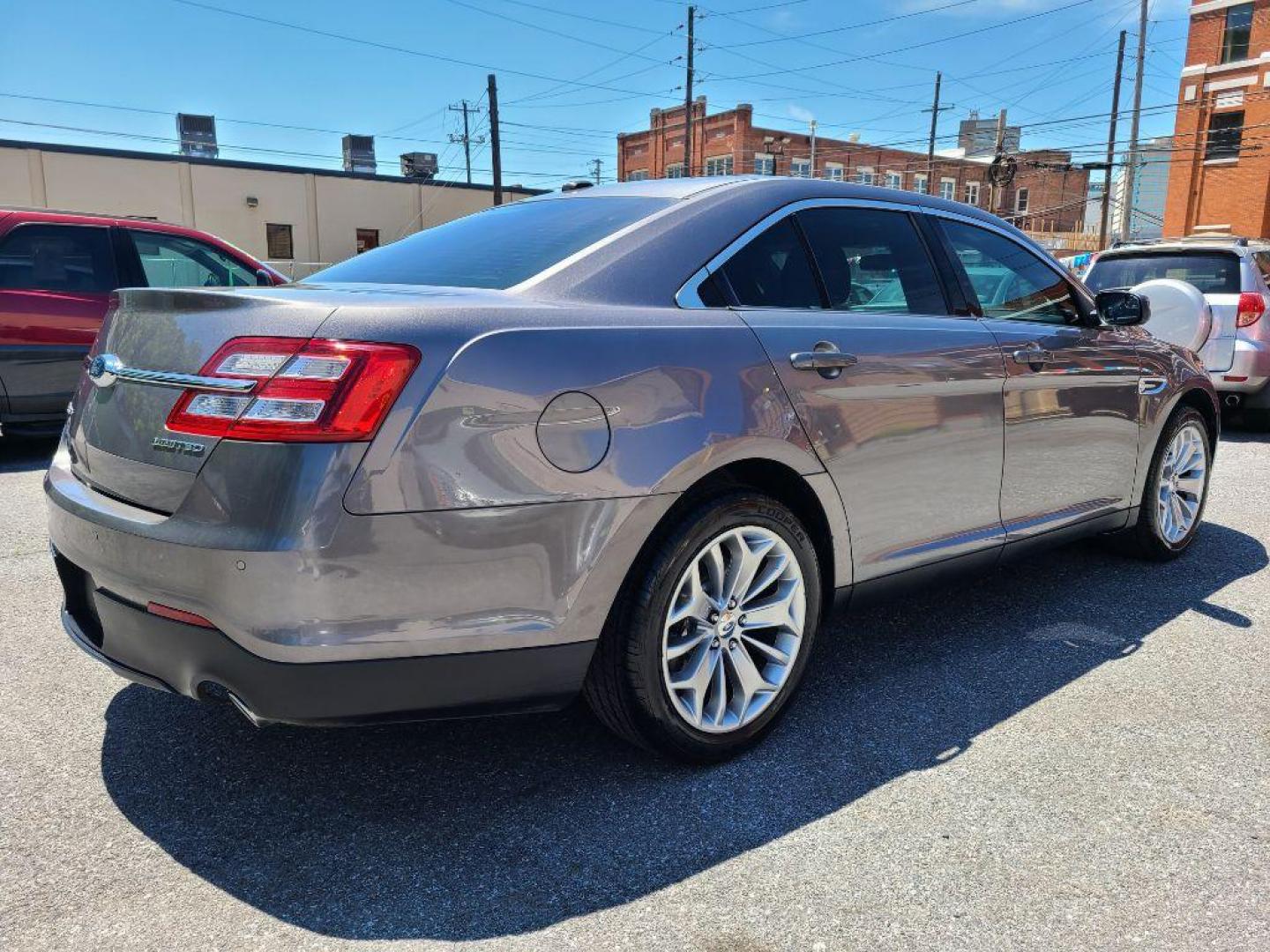 2014 GRAY FORD TAURUS LIMITED (1FAHP2F8XEG) with an 3.5L engine, Automatic transmission, located at 117 North Cameron Street, Harrisburg, PA, 17101, (717) 963-8962, 40.266762, -76.875259 - WE FINANCE!!! Good Credit/ Bad Credit/ No Credit - ALL Trade-Ins Welcomed!!! ***Guaranteed Credit Approval*** APPLY ONLINE or CALL us TODAY ;) Internet Prices and Marketplace Prices are SPECIAL discounted ***CASH DEALS*** Retail Prices are higher. Please call us to discuss your cash and finan - Photo#4