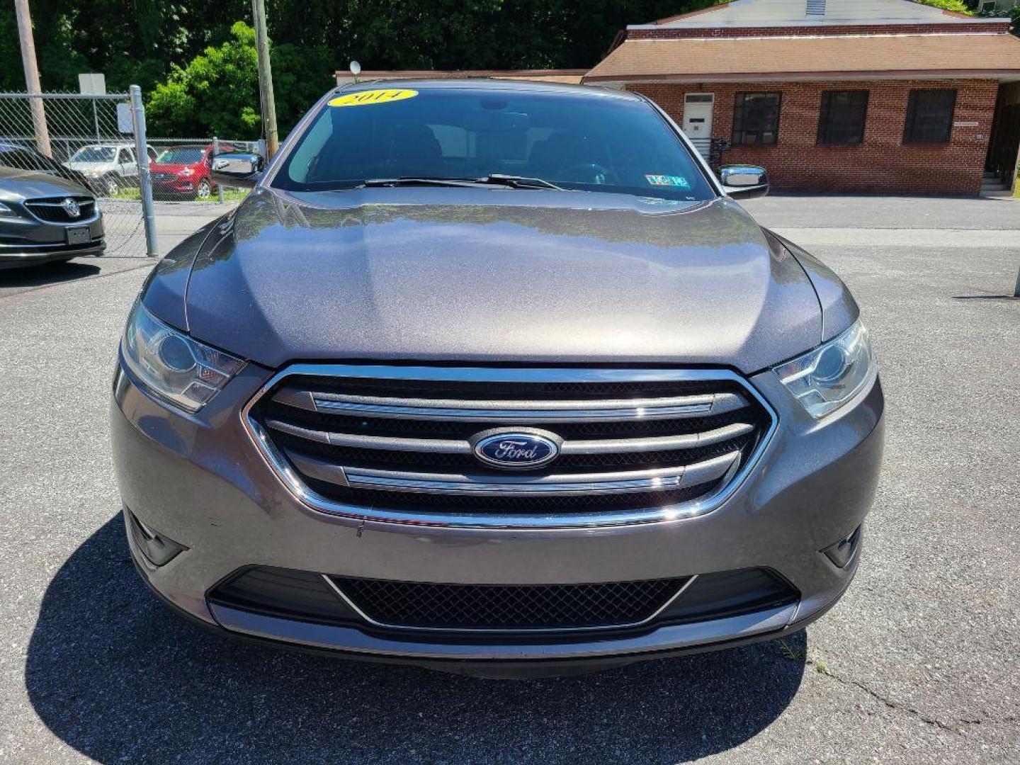 2014 GRAY FORD TAURUS LIMITED (1FAHP2F8XEG) with an 3.5L engine, Automatic transmission, located at 117 North Cameron Street, Harrisburg, PA, 17101, (717) 963-8962, 40.266762, -76.875259 - WE FINANCE!!! Good Credit/ Bad Credit/ No Credit - ALL Trade-Ins Welcomed!!! ***Guaranteed Credit Approval*** APPLY ONLINE or CALL us TODAY ;) Internet Prices and Marketplace Prices are SPECIAL discounted ***CASH DEALS*** Retail Prices are higher. Please call us to discuss your cash and finan - Photo#7