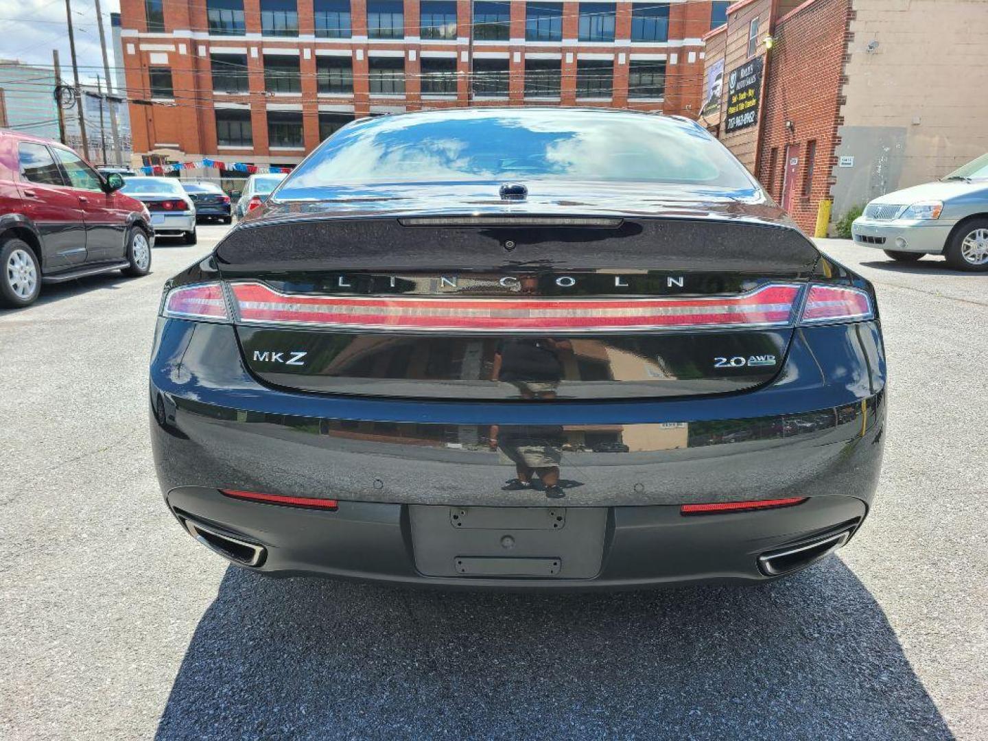 2014 BLACK LINCOLN MKZ SEDAN (3LN6L2J97ER) with an 2.0L engine, Automatic transmission, located at 7981 Paxton Street, Harrisburg, PA, 17111, (717) 561-2926, 40.261490, -76.749229 - WE FINANCE!!! Good Credit/ Bad Credit/ No Credit - ALL Trade-Ins Welcomed!!! ***Guaranteed Credit Approval*** APPLY ONLINE or CALL us TODAY ;) Internet Prices and Marketplace Prices are SPECIAL discounted ***CASH DEALS*** Retail Prices are higher. Please call us to discuss your cash and finan - Photo#3