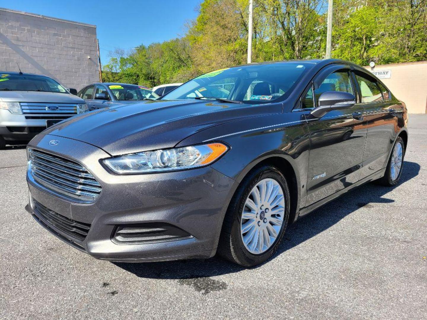 2015 GRAY FORD FUSION SE HYBRID (3FA6P0LU0FR) with an 2.0L engine, Continuously Variable transmission, located at 7981 Paxton Street, Harrisburg, PA, 17111, (717) 561-2926, 40.261490, -76.749229 - WE FINANCE!!! Good Credit/ Bad Credit/ No Credit - ALL Trade-Ins Welcomed!!! ***Guaranteed Credit Approval*** APPLY ONLINE or CALL us TODAY ;) Internet Prices and Marketplace Prices are SPECIAL discounted ***CASH DEALS*** Retail Prices are higher. Please call us to discuss your cash and finan - Photo#0