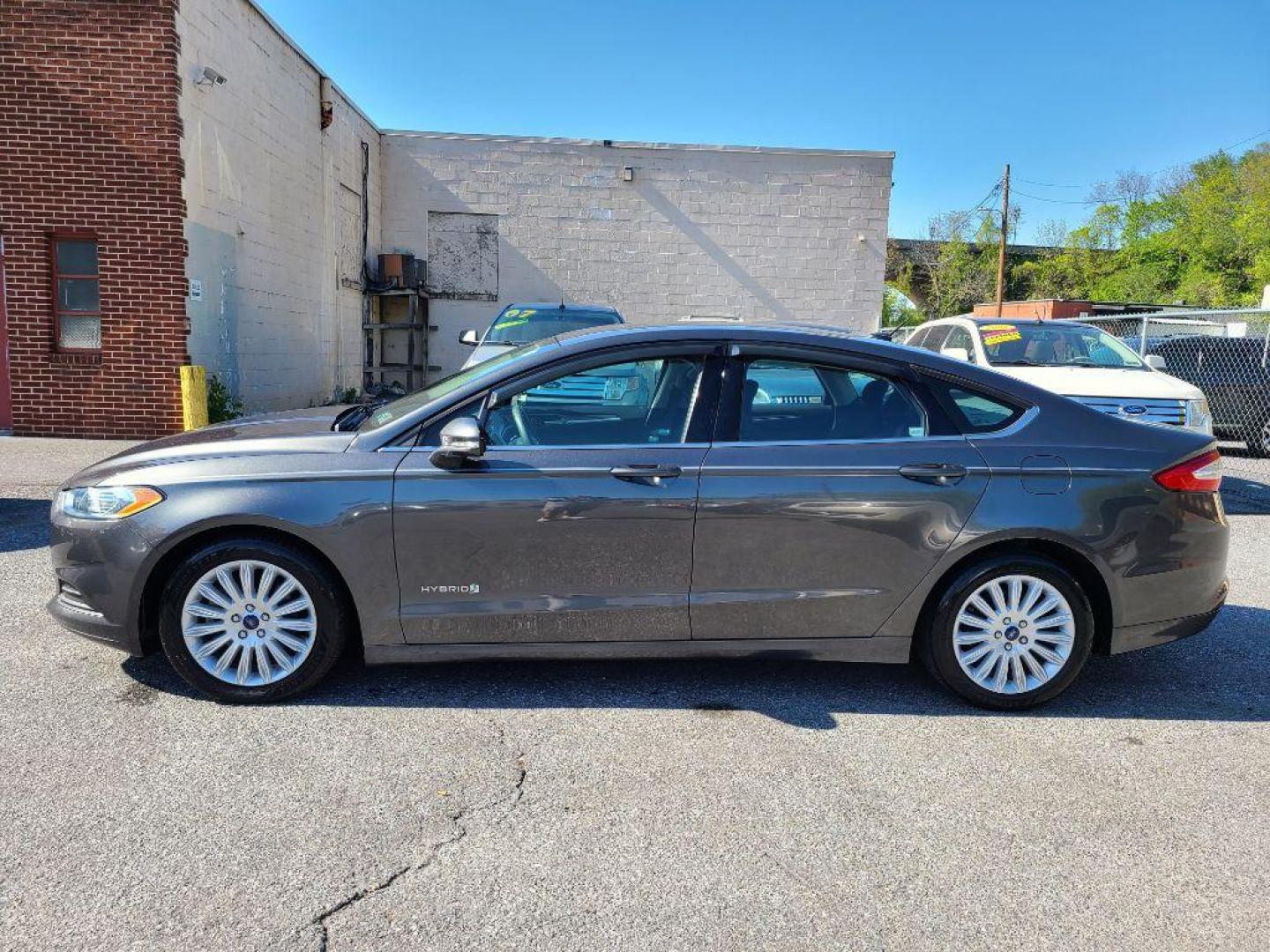 2015 GRAY FORD FUSION SE HYBRID (3FA6P0LU0FR) with an 2.0L engine, Continuously Variable transmission, located at 7981 Paxton Street, Harrisburg, PA, 17111, (717) 561-2926, 40.261490, -76.749229 - WE FINANCE!!! Good Credit/ Bad Credit/ No Credit - ALL Trade-Ins Welcomed!!! ***Guaranteed Credit Approval*** APPLY ONLINE or CALL us TODAY ;) Internet Prices and Marketplace Prices are SPECIAL discounted ***CASH DEALS*** Retail Prices are higher. Please call us to discuss your cash and finan - Photo#1