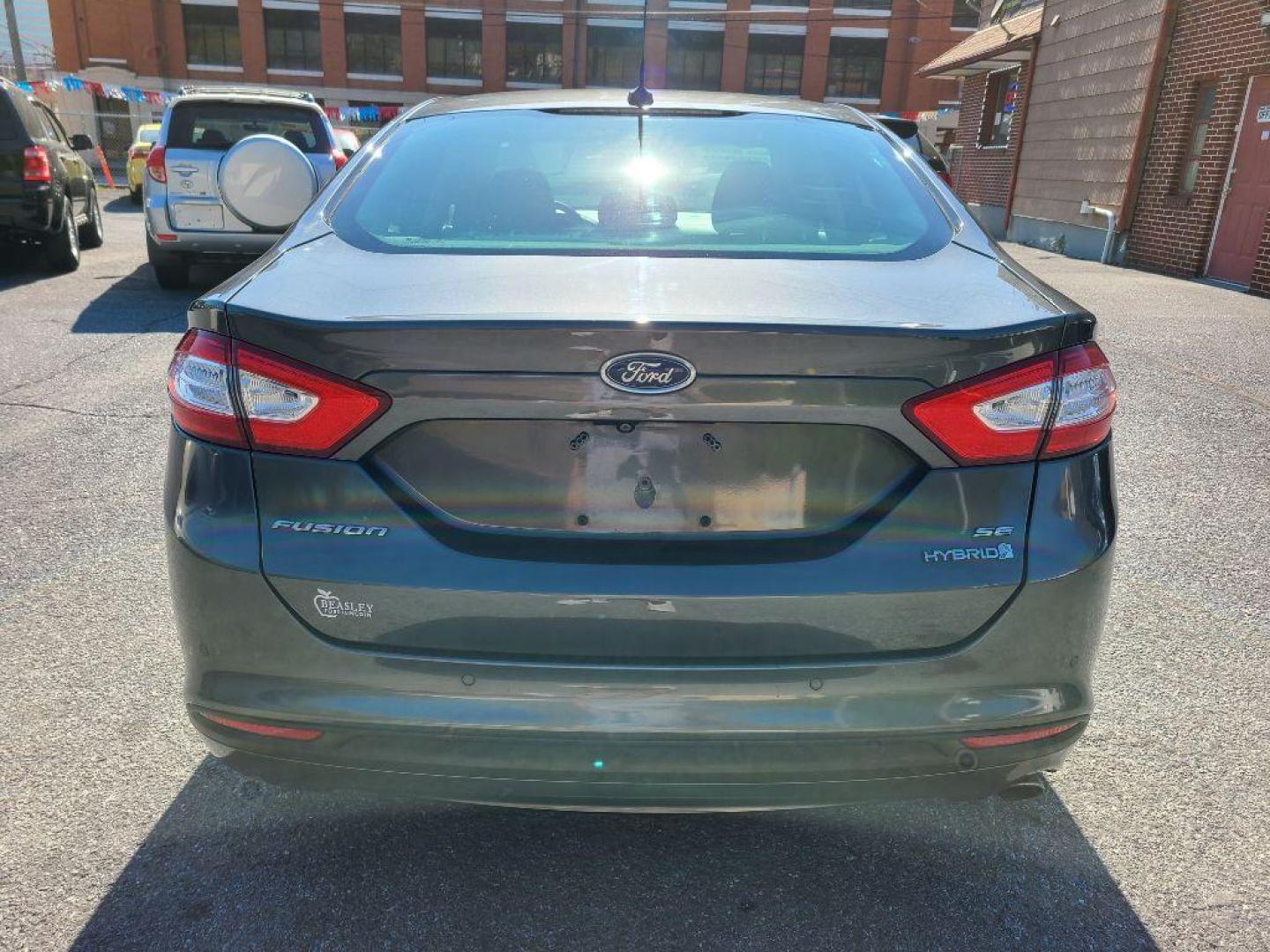 2015 GRAY FORD FUSION SE HYBRID (3FA6P0LU0FR) with an 2.0L engine, Continuously Variable transmission, located at 7981 Paxton Street, Harrisburg, PA, 17111, (717) 561-2926, 40.261490, -76.749229 - WE FINANCE!!! Good Credit/ Bad Credit/ No Credit - ALL Trade-Ins Welcomed!!! ***Guaranteed Credit Approval*** APPLY ONLINE or CALL us TODAY ;) Internet Prices and Marketplace Prices are SPECIAL discounted ***CASH DEALS*** Retail Prices are higher. Please call us to discuss your cash and finan - Photo#3