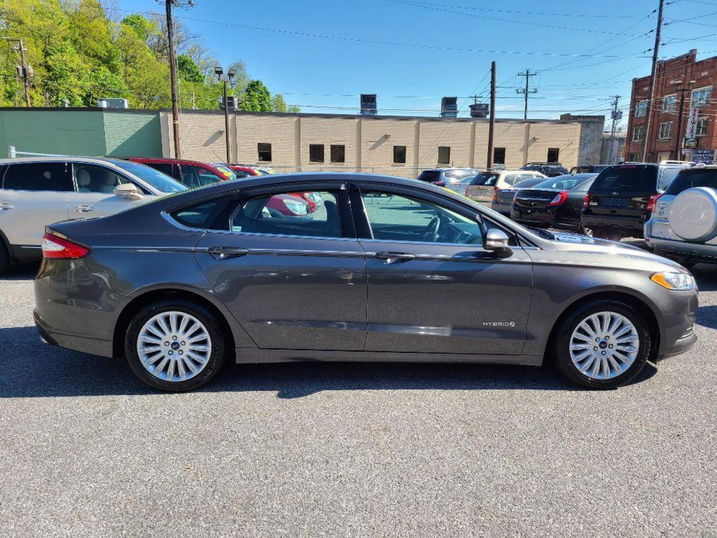 2015 GRAY FORD FUSION SE HYBRID (3FA6P0LU0FR) with an 2.0L engine, Continuously Variable transmission, located at 7981 Paxton Street, Harrisburg, PA, 17111, (717) 561-2926, 40.261490, -76.749229 - WE FINANCE!!! Good Credit/ Bad Credit/ No Credit - ALL Trade-Ins Welcomed!!! ***Guaranteed Credit Approval*** APPLY ONLINE or CALL us TODAY ;) Internet Prices and Marketplace Prices are SPECIAL discounted ***CASH DEALS*** Retail Prices are higher. Please call us to discuss your cash and finan - Photo#5