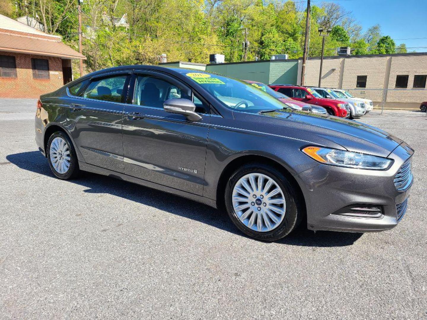 2015 GRAY FORD FUSION SE HYBRID (3FA6P0LU0FR) with an 2.0L engine, Continuously Variable transmission, located at 7981 Paxton Street, Harrisburg, PA, 17111, (717) 561-2926, 40.261490, -76.749229 - WE FINANCE!!! Good Credit/ Bad Credit/ No Credit - ALL Trade-Ins Welcomed!!! ***Guaranteed Credit Approval*** APPLY ONLINE or CALL us TODAY ;) Internet Prices and Marketplace Prices are SPECIAL discounted ***CASH DEALS*** Retail Prices are higher. Please call us to discuss your cash and finan - Photo#6