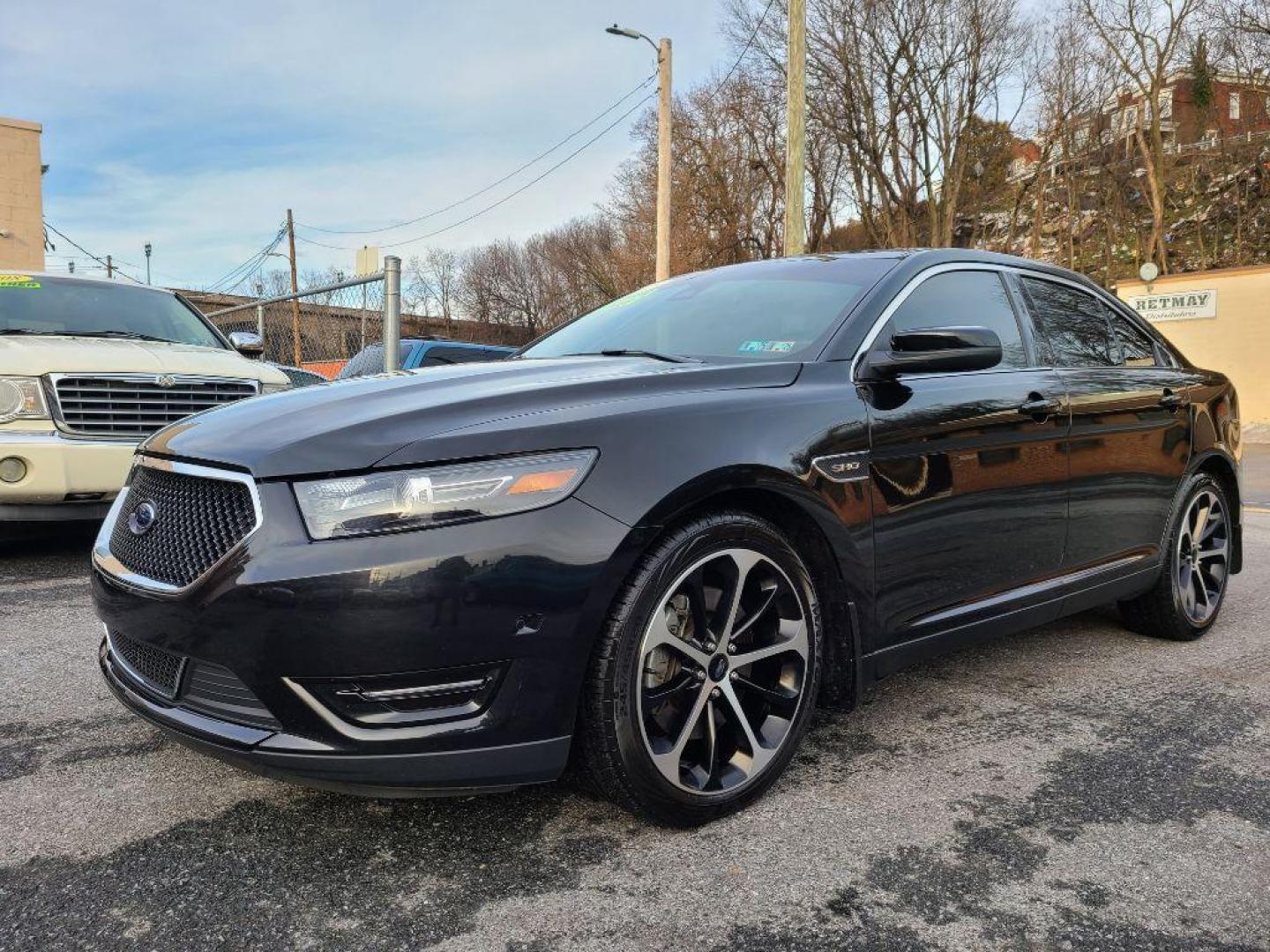 2015 BLACK FORD TAURUS SHO (1FAHP2KT3FG) with an 3.5L engine, Automatic transmission, located at 117 North Cameron Street, Harrisburg, PA, 17101, (717) 963-8962, 40.266762, -76.875259 - WE FINANCE!!! Good Credit/ Bad Credit/ No Credit - ALL Trade-Ins Welcomed!!! ***Guaranteed Credit Approval*** APPLY ONLINE or CALL us TODAY ;) Internet Prices and Marketplace Prices are SPECIAL discounted ***CASH DEALS*** Retail Prices are higher. Please call us to discuss your cash and finan - Photo#0