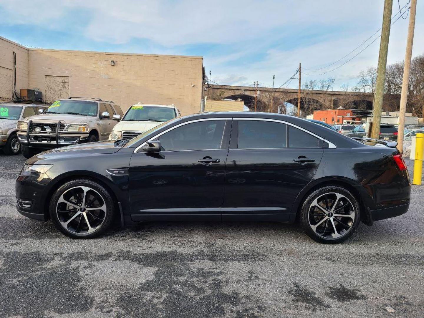 2015 BLACK FORD TAURUS SHO (1FAHP2KT3FG) with an 3.5L engine, Automatic transmission, located at 117 North Cameron Street, Harrisburg, PA, 17101, (717) 963-8962, 40.266762, -76.875259 - WE FINANCE!!! Good Credit/ Bad Credit/ No Credit - ALL Trade-Ins Welcomed!!! ***Guaranteed Credit Approval*** APPLY ONLINE or CALL us TODAY ;) Internet Prices and Marketplace Prices are SPECIAL discounted ***CASH DEALS*** Retail Prices are higher. Please call us to discuss your cash and finan - Photo#1