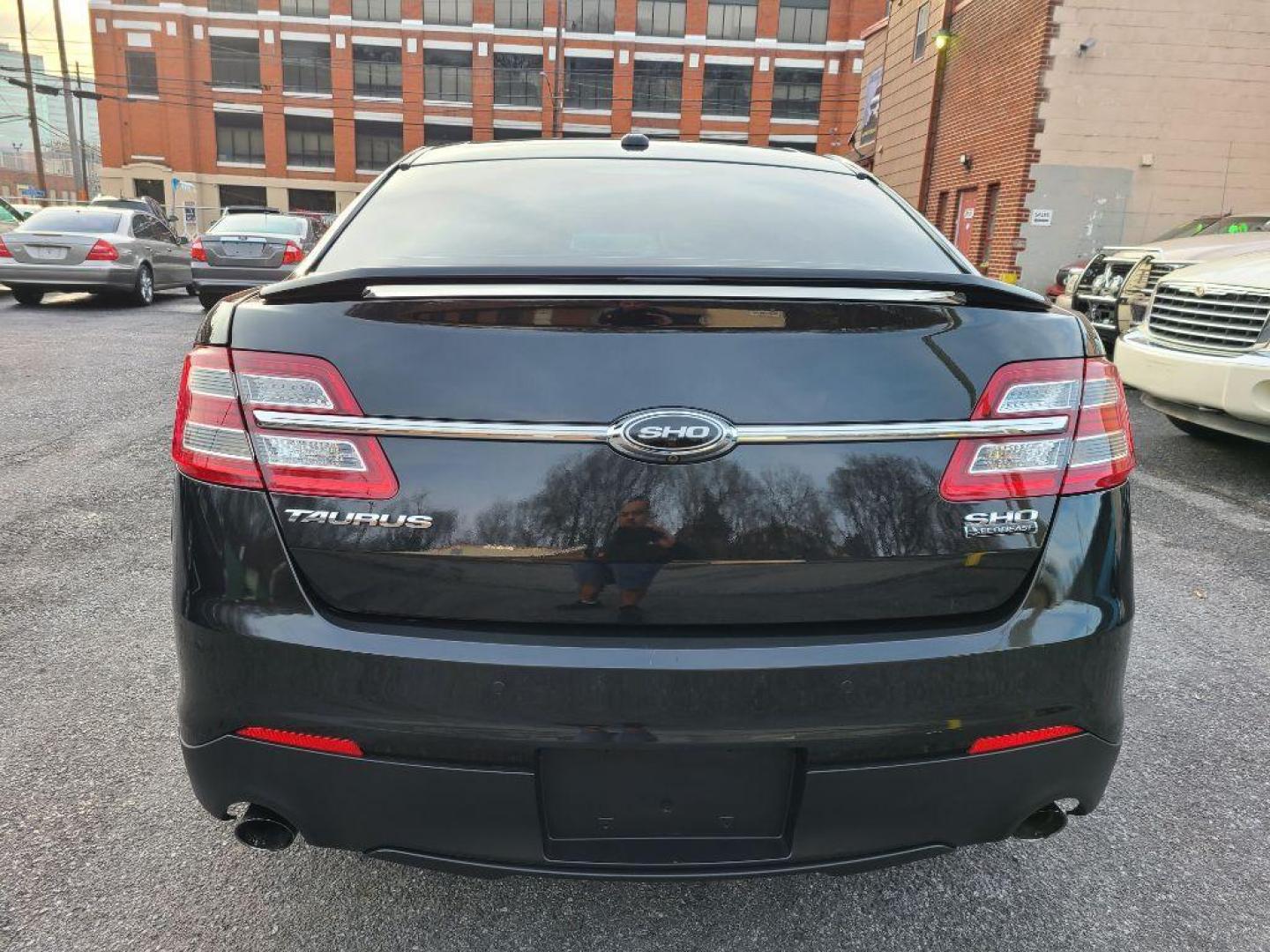 2015 BLACK FORD TAURUS SHO (1FAHP2KT3FG) with an 3.5L engine, Automatic transmission, located at 117 North Cameron Street, Harrisburg, PA, 17101, (717) 963-8962, 40.266762, -76.875259 - WE FINANCE!!! Good Credit/ Bad Credit/ No Credit - ALL Trade-Ins Welcomed!!! ***Guaranteed Credit Approval*** APPLY ONLINE or CALL us TODAY ;) Internet Prices and Marketplace Prices are SPECIAL discounted ***CASH DEALS*** Retail Prices are higher. Please call us to discuss your cash and finan - Photo#3