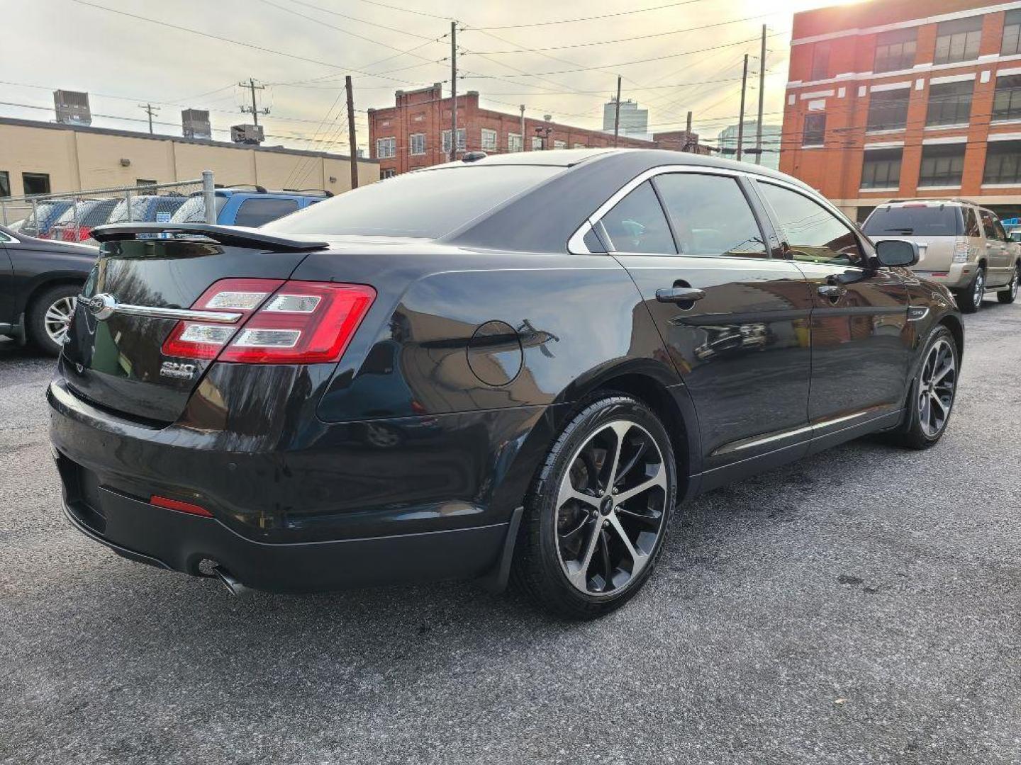 2015 BLACK FORD TAURUS SHO (1FAHP2KT3FG) with an 3.5L engine, Automatic transmission, located at 117 North Cameron Street, Harrisburg, PA, 17101, (717) 963-8962, 40.266762, -76.875259 - WE FINANCE!!! Good Credit/ Bad Credit/ No Credit - ALL Trade-Ins Welcomed!!! ***Guaranteed Credit Approval*** APPLY ONLINE or CALL us TODAY ;) Internet Prices and Marketplace Prices are SPECIAL discounted ***CASH DEALS*** Retail Prices are higher. Please call us to discuss your cash and finan - Photo#4