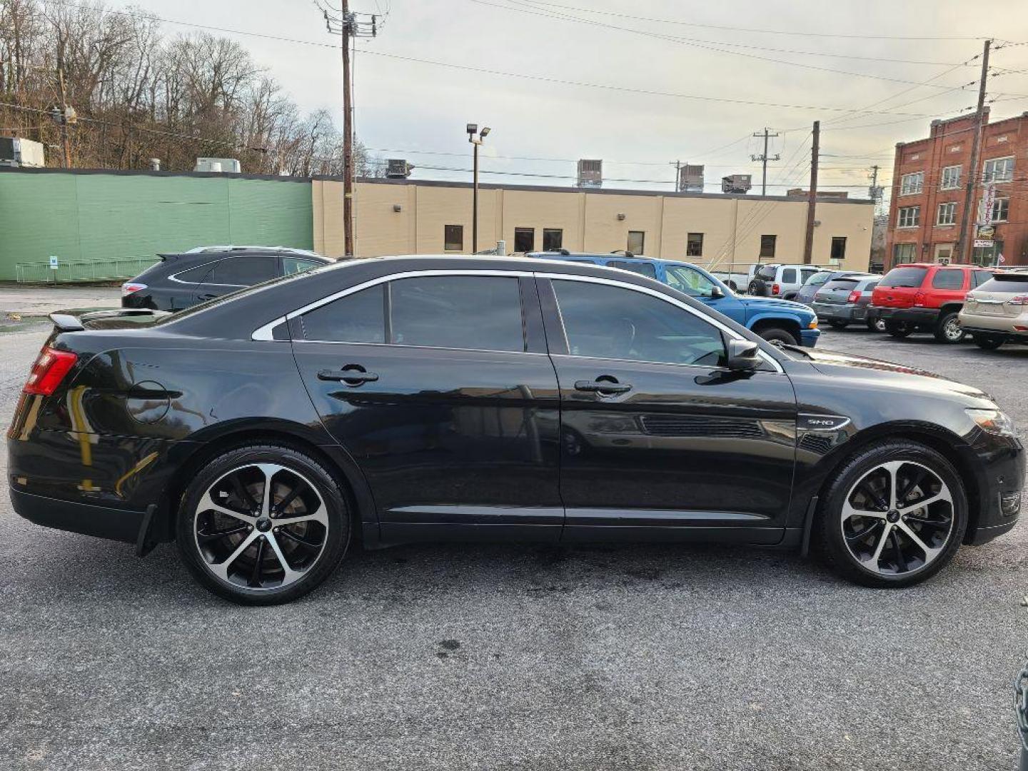 2015 BLACK FORD TAURUS SHO (1FAHP2KT3FG) with an 3.5L engine, Automatic transmission, located at 117 North Cameron Street, Harrisburg, PA, 17101, (717) 963-8962, 40.266762, -76.875259 - WE FINANCE!!! Good Credit/ Bad Credit/ No Credit - ALL Trade-Ins Welcomed!!! ***Guaranteed Credit Approval*** APPLY ONLINE or CALL us TODAY ;) Internet Prices and Marketplace Prices are SPECIAL discounted ***CASH DEALS*** Retail Prices are higher. Please call us to discuss your cash and finan - Photo#5