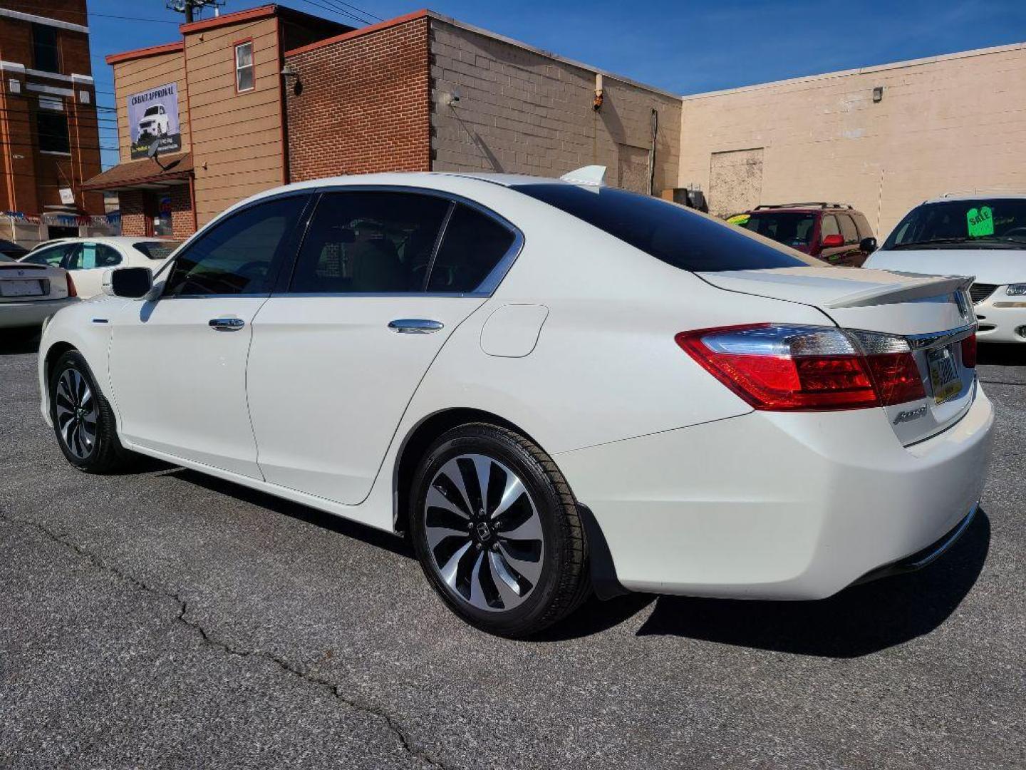 2015 WHITE HONDA ACCORD TOURING HYBRID (1HGCR6F76FA) with an 2.0L engine, Continuously Variable transmission, located at 7981 Paxton Street, Harrisburg, PA, 17111, (717) 561-2926, 40.261490, -76.749229 - WE FINANCE!!! Good Credit/ Bad Credit/ No Credit - ALL Trade-Ins Welcomed!!! ***Guaranteed Credit Approval*** APPLY ONLINE or CALL us TODAY ;) Internet Prices and Marketplace Prices are SPECIAL discounted ***CASH DEALS*** Retail Prices are higher. Please call us to discuss your cash and finan - Photo#2