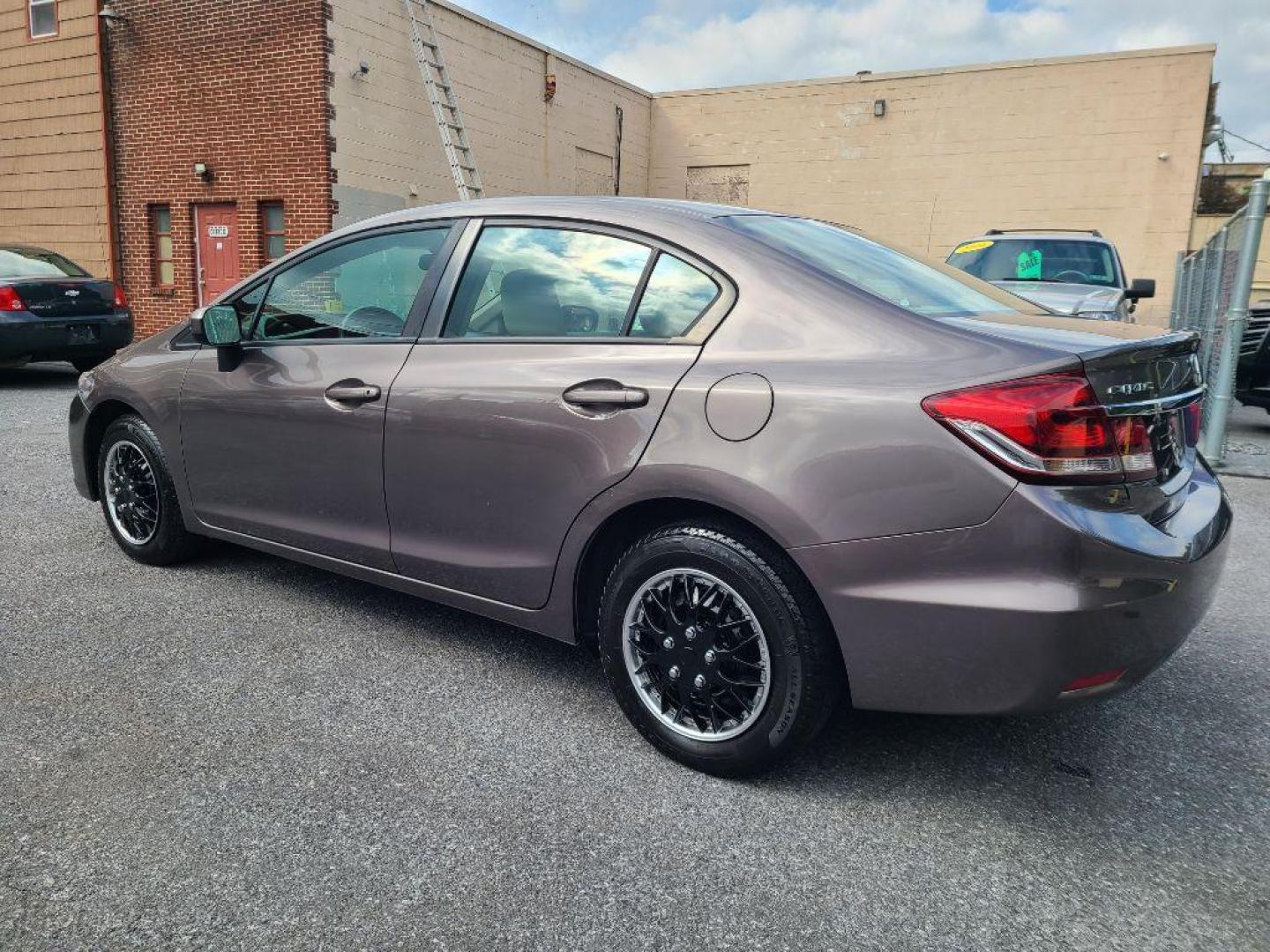 2015 BROWN HONDA CIVIC LX (19XFB2F56FE) with an 1.8L engine, Continuously Variable transmission, located at 7981 Paxton Street, Harrisburg, PA, 17111, (717) 561-2926, 40.261490, -76.749229 - WE FINANCE!!! Good Credit/ Bad Credit/ No Credit - ALL Trade-Ins Welcomed!!! ***Guaranteed Credit Approval*** APPLY ONLINE or CALL us TODAY ;) Internet Prices and Marketplace Prices are SPECIAL discounted ***CASH DEALS*** Retail Prices are higher. Please call us to discuss your cash and finan - Photo#2