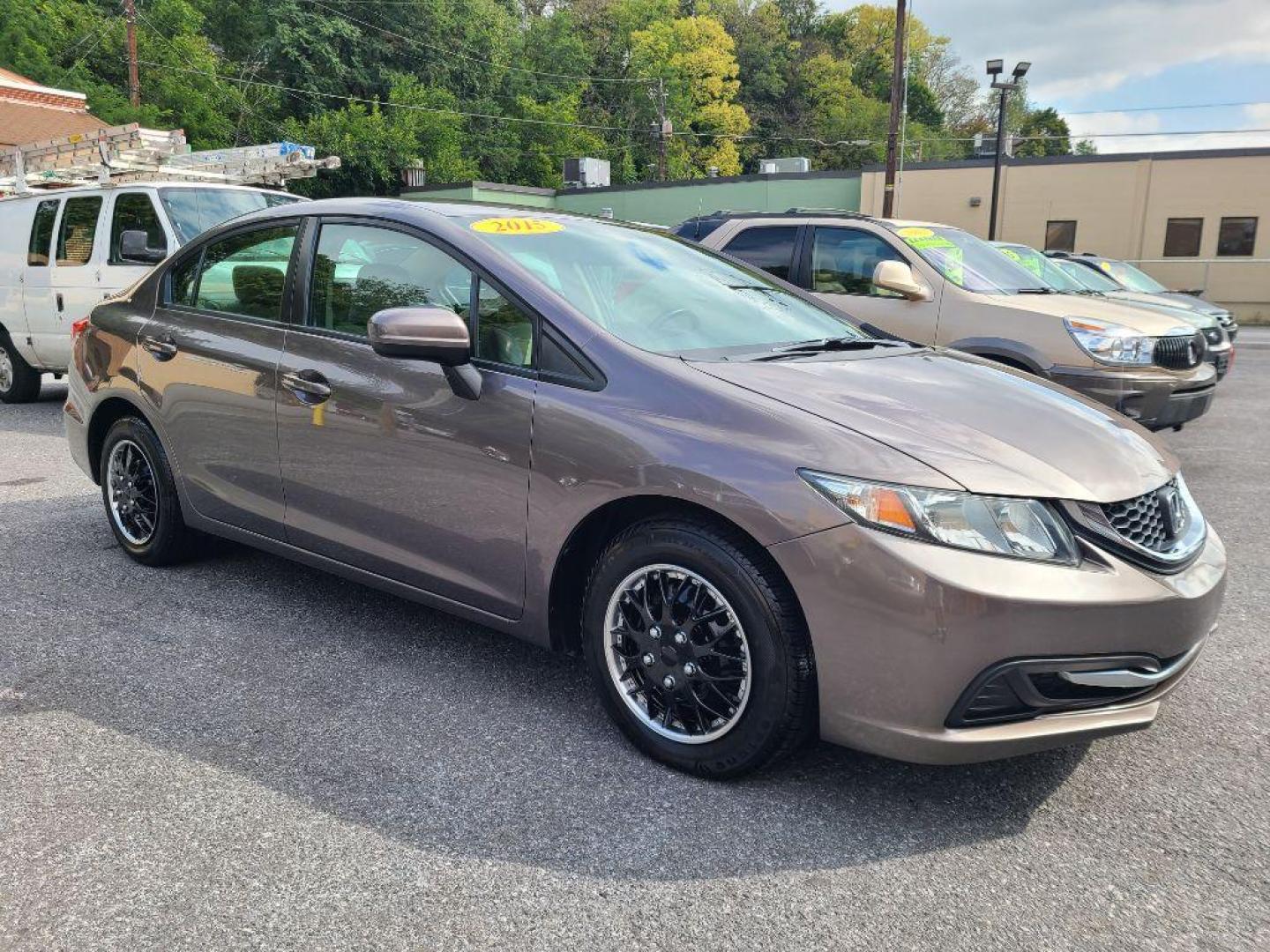 2015 BROWN HONDA CIVIC LX (19XFB2F56FE) with an 1.8L engine, Continuously Variable transmission, located at 7981 Paxton Street, Harrisburg, PA, 17111, (717) 561-2926, 40.261490, -76.749229 - WE FINANCE!!! Good Credit/ Bad Credit/ No Credit - ALL Trade-Ins Welcomed!!! ***Guaranteed Credit Approval*** APPLY ONLINE or CALL us TODAY ;) Internet Prices and Marketplace Prices are SPECIAL discounted ***CASH DEALS*** Retail Prices are higher. Please call us to discuss your cash and finan - Photo#6