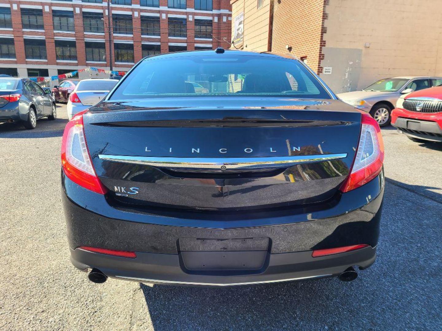 2015 BLACK LINCOLN MKS SEDAN AWD (1LNHL9FT7FG) with an 3.5L engine, Automatic transmission, located at 7981 Paxton Street, Harrisburg, PA, 17111, (717) 561-2926, 40.261490, -76.749229 - WE FINANCE!!! Good Credit/ Bad Credit/ No Credit - ALL Trade-Ins Welcomed!!! ***Guaranteed Credit Approval*** APPLY ONLINE or CALL us TODAY ;) Internet Prices and Marketplace Prices are SPECIAL discounted ***CASH DEALS*** Retail Prices are higher. Please call us to discuss your cash and finan - Photo#3