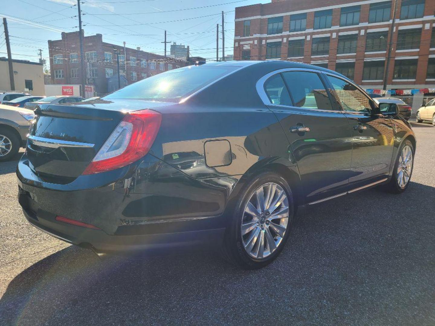 2015 BLACK LINCOLN MKS SEDAN AWD (1LNHL9FT7FG) with an 3.5L engine, Automatic transmission, located at 7981 Paxton Street, Harrisburg, PA, 17111, (717) 561-2926, 40.261490, -76.749229 - WE FINANCE!!! Good Credit/ Bad Credit/ No Credit - ALL Trade-Ins Welcomed!!! ***Guaranteed Credit Approval*** APPLY ONLINE or CALL us TODAY ;) Internet Prices and Marketplace Prices are SPECIAL discounted ***CASH DEALS*** Retail Prices are higher. Please call us to discuss your cash and finan - Photo#4