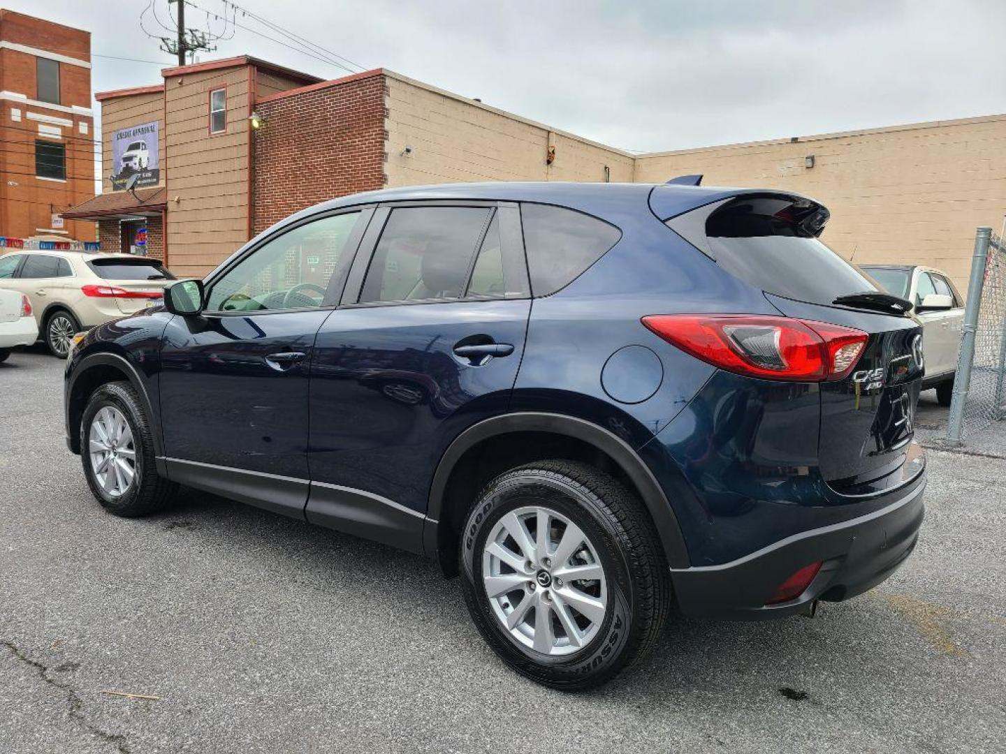 2015 BLUE MAZDA CX-5 TOURING (JM3KE4CY5F0) with an 2.5L engine, Automatic transmission, located at 117 North Cameron Street, Harrisburg, PA, 17101, (717) 963-8962, 40.266762, -76.875259 - WE FINANCE!!! Good Credit/ Bad Credit/ No Credit - ALL Trade-Ins Welcomed!!! ***Guaranteed Credit Approval*** APPLY ONLINE or CALL us TODAY ;) Internet Prices and Marketplace Prices are SPECIAL discounted ***CASH DEALS*** Retail Prices are higher. Please call us to discuss your cash and finan - Photo#2