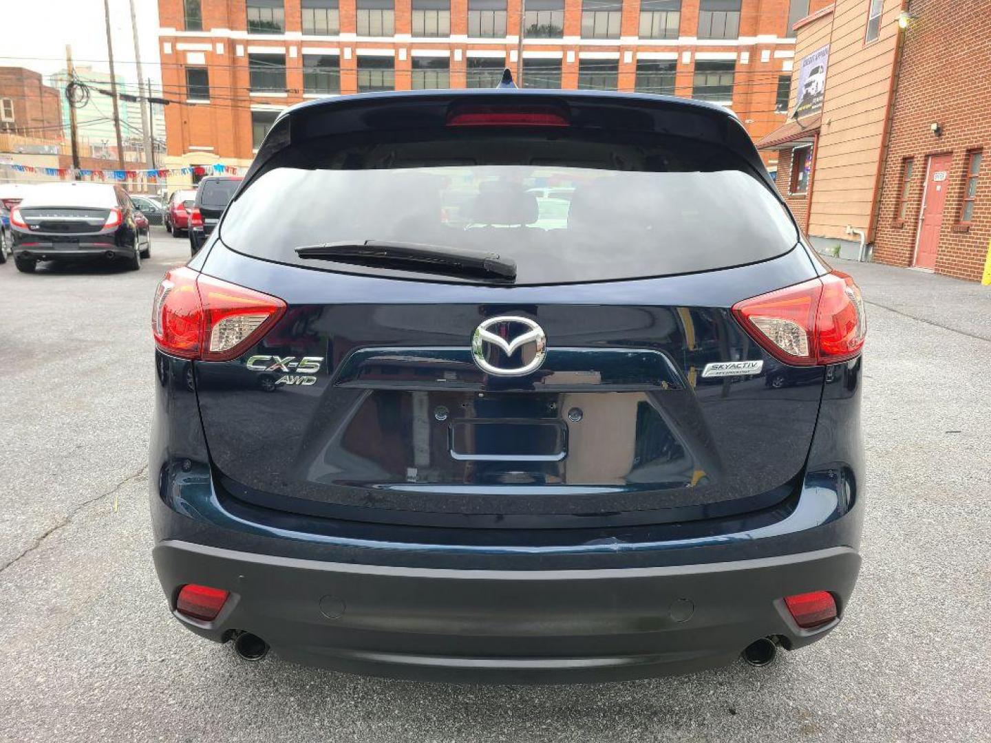 2015 BLUE MAZDA CX-5 TOURING (JM3KE4CY5F0) with an 2.5L engine, Automatic transmission, located at 117 North Cameron Street, Harrisburg, PA, 17101, (717) 963-8962, 40.266762, -76.875259 - WE FINANCE!!! Good Credit/ Bad Credit/ No Credit - ALL Trade-Ins Welcomed!!! ***Guaranteed Credit Approval*** APPLY ONLINE or CALL us TODAY ;) Internet Prices and Marketplace Prices are SPECIAL discounted ***CASH DEALS*** Retail Prices are higher. Please call us to discuss your cash and finan - Photo#3