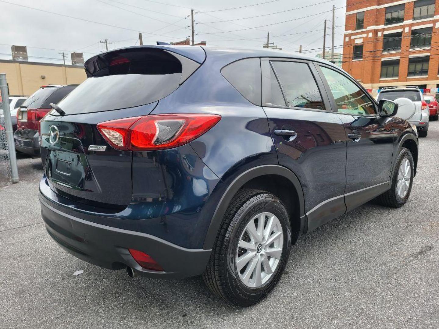 2015 BLUE MAZDA CX-5 TOURING (JM3KE4CY5F0) with an 2.5L engine, Automatic transmission, located at 117 North Cameron Street, Harrisburg, PA, 17101, (717) 963-8962, 40.266762, -76.875259 - WE FINANCE!!! Good Credit/ Bad Credit/ No Credit - ALL Trade-Ins Welcomed!!! ***Guaranteed Credit Approval*** APPLY ONLINE or CALL us TODAY ;) Internet Prices and Marketplace Prices are SPECIAL discounted ***CASH DEALS*** Retail Prices are higher. Please call us to discuss your cash and finan - Photo#4