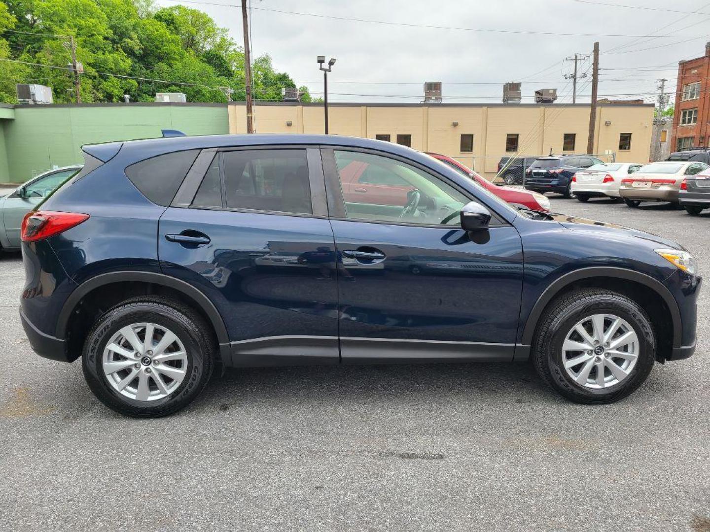 2015 BLUE MAZDA CX-5 TOURING (JM3KE4CY5F0) with an 2.5L engine, Automatic transmission, located at 117 North Cameron Street, Harrisburg, PA, 17101, (717) 963-8962, 40.266762, -76.875259 - WE FINANCE!!! Good Credit/ Bad Credit/ No Credit - ALL Trade-Ins Welcomed!!! ***Guaranteed Credit Approval*** APPLY ONLINE or CALL us TODAY ;) Internet Prices and Marketplace Prices are SPECIAL discounted ***CASH DEALS*** Retail Prices are higher. Please call us to discuss your cash and finan - Photo#5