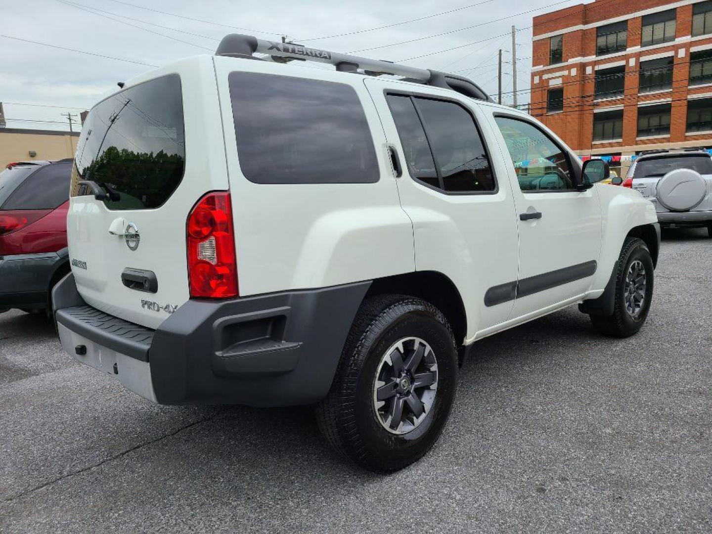 2015 WHITE NISSAN XTERRA PRO 4X (5N1AN0NW0FN) with an 4.0L engine, Automatic transmission, located at 7981 Paxton Street, Harrisburg, PA, 17111, (717) 561-2926, 40.261490, -76.749229 - WE FINANCE!!! Good Credit/ Bad Credit/ No Credit - ALL Trade-Ins Welcomed!!! ***Guaranteed Credit Approval*** APPLY ONLINE or CALL us TODAY ;) Internet Prices and Marketplace Prices are SPECIAL discounted ***CASH DEALS*** Retail Prices are higher. Please call us to discuss your cash and finan - Photo#4