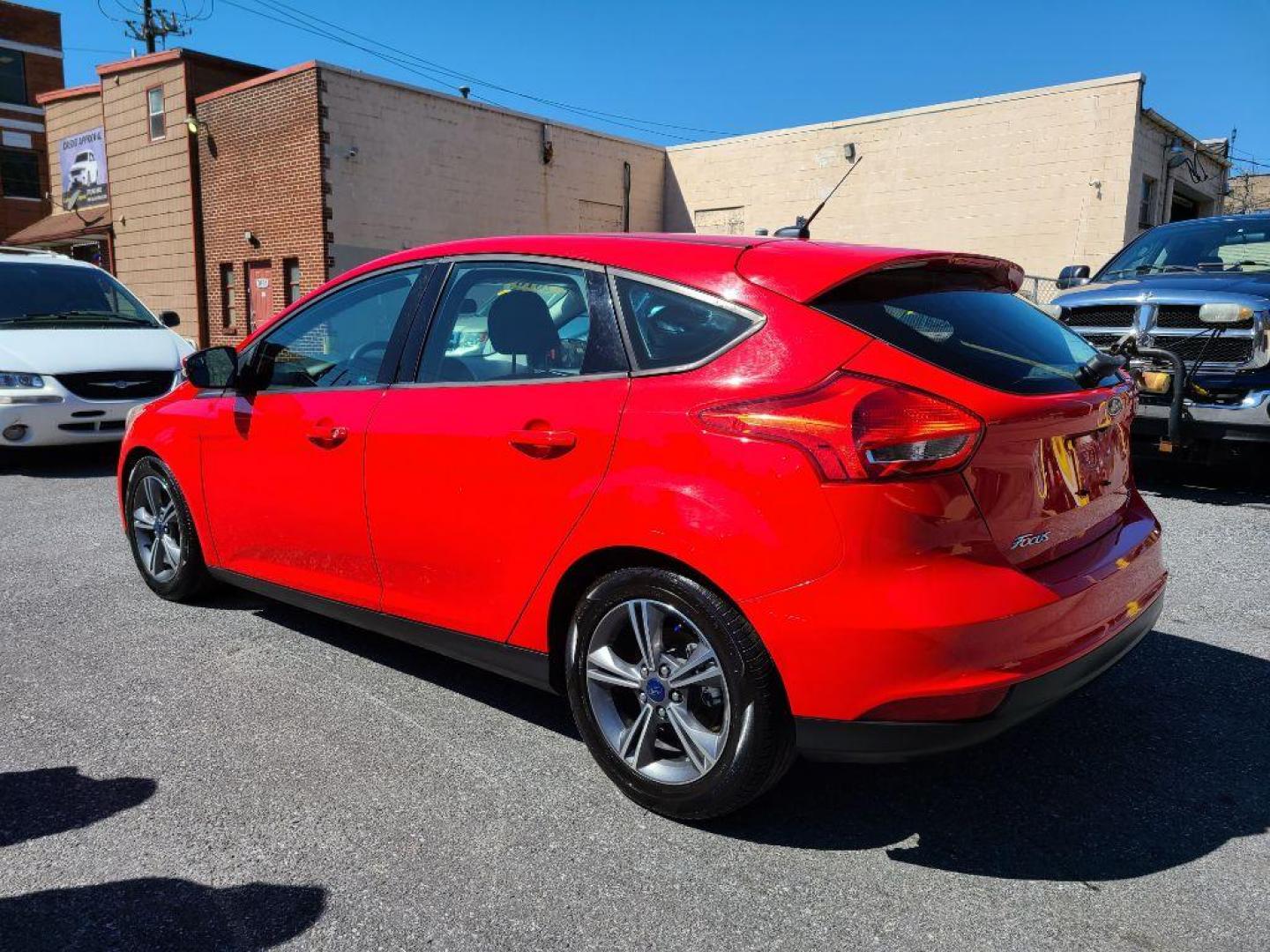 2016 RED FORD FOCUS SE (1FADP3KE0GL) with an 1.0L engine, Automatic transmission, located at 7981 Paxton Street, Harrisburg, PA, 17111, (717) 561-2926, 40.261490, -76.749229 - WE FINANCE!!! Good Credit/ Bad Credit/ No Credit - ALL Trade-Ins Welcomed!!! ***Guaranteed Credit Approval*** APPLY ONLINE or CALL us TODAY ;) Internet Prices and Marketplace Prices are SPECIAL discounted ***CASH DEALS*** Retail Prices are higher. Please call us to discuss your cash and finan - Photo#2