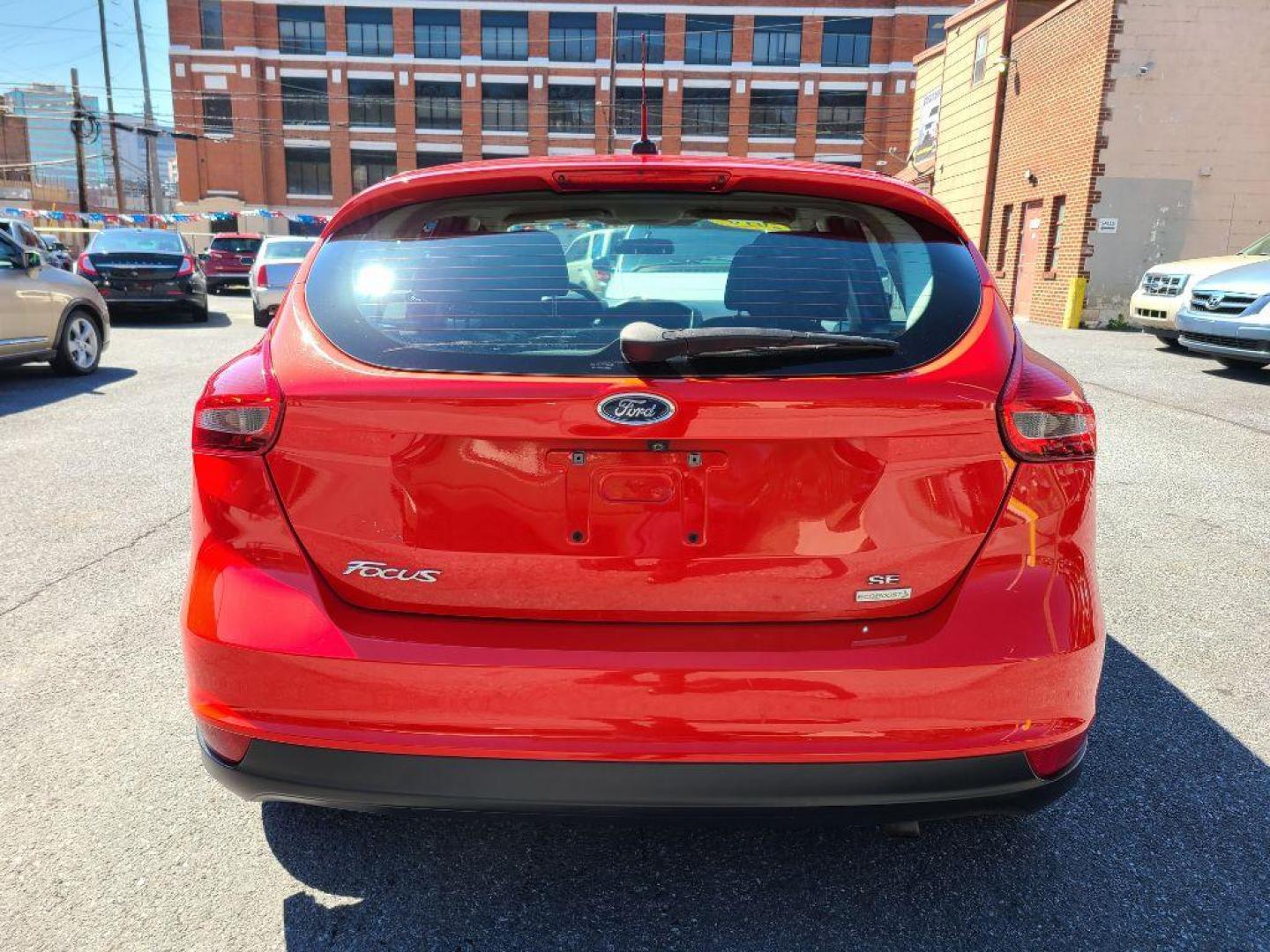 2016 RED FORD FOCUS SE (1FADP3KE0GL) with an 1.0L engine, Automatic transmission, located at 7981 Paxton Street, Harrisburg, PA, 17111, (717) 561-2926, 40.261490, -76.749229 - WE FINANCE!!! Good Credit/ Bad Credit/ No Credit - ALL Trade-Ins Welcomed!!! ***Guaranteed Credit Approval*** APPLY ONLINE or CALL us TODAY ;) Internet Prices and Marketplace Prices are SPECIAL discounted ***CASH DEALS*** Retail Prices are higher. Please call us to discuss your cash and finan - Photo#3