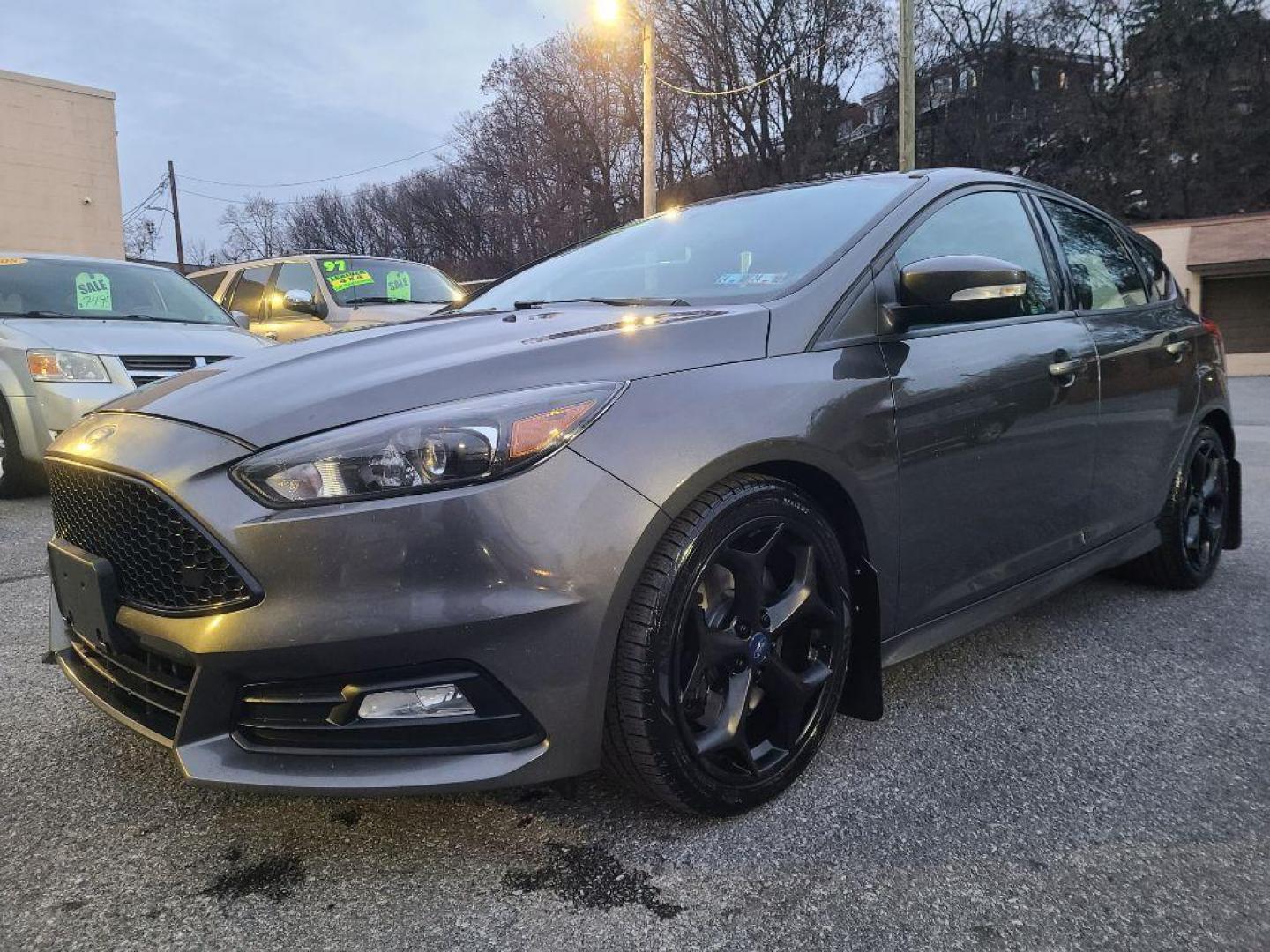 2016 GRAY FORD FOCUS ST (1FADP3L90GL) with an 2.0L engine, 6-Speed Manual transmission, located at 117 North Cameron Street, Harrisburg, PA, 17101, (717) 963-8962, 40.266762, -76.875259 - WE FINANCE!!! Good Credit/ Bad Credit/ No Credit - ALL Trade-Ins Welcomed!!! ***Guaranteed Credit Approval*** APPLY ONLINE or CALL us TODAY ;) Internet Prices and Marketplace Prices are SPECIAL discounted ***CASH DEALS*** Retail Prices are higher. Please call us to discuss your cash and finan - Photo#0