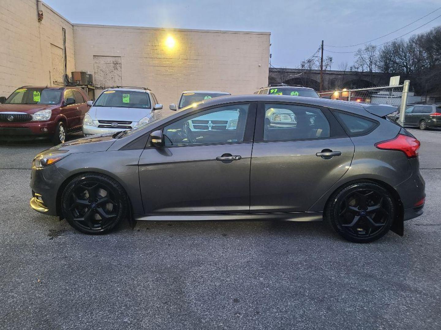 2016 GRAY FORD FOCUS ST (1FADP3L90GL) with an 2.0L engine, 6-Speed Manual transmission, located at 117 North Cameron Street, Harrisburg, PA, 17101, (717) 963-8962, 40.266762, -76.875259 - WE FINANCE!!! Good Credit/ Bad Credit/ No Credit - ALL Trade-Ins Welcomed!!! ***Guaranteed Credit Approval*** APPLY ONLINE or CALL us TODAY ;) Internet Prices and Marketplace Prices are SPECIAL discounted ***CASH DEALS*** Retail Prices are higher. Please call us to discuss your cash and finan - Photo#1