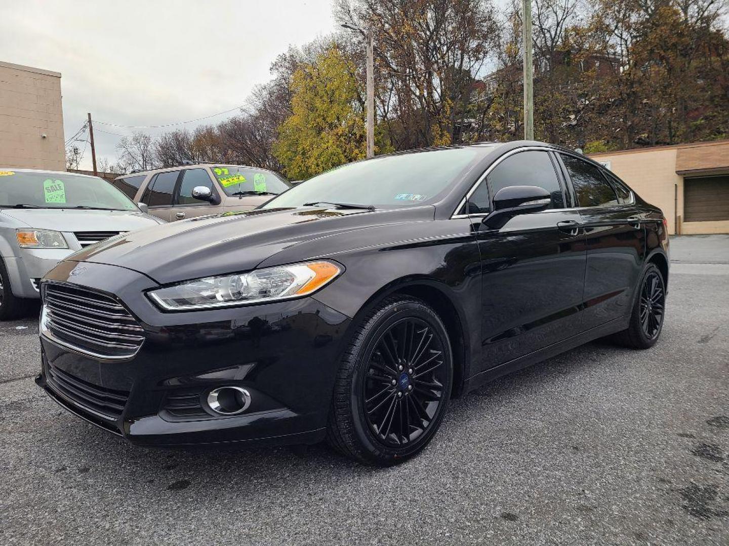 2016 BLACK FORD FUSION SE (3FA6P0HD2GR) with an 1.5L engine, Automatic transmission, located at 7981 Paxton Street, Harrisburg, PA, 17111, (717) 561-2926, 40.261490, -76.749229 - WE FINANCE!!! Good Credit/ Bad Credit/ No Credit - ALL Trade-Ins Welcomed!!! ***Guaranteed Credit Approval*** APPLY ONLINE or CALL us TODAY ;) Internet Prices and Marketplace Prices are SPECIAL discounted ***CASH DEALS*** Retail Prices are higher. Please call us to discuss your cash and finan - Photo#0