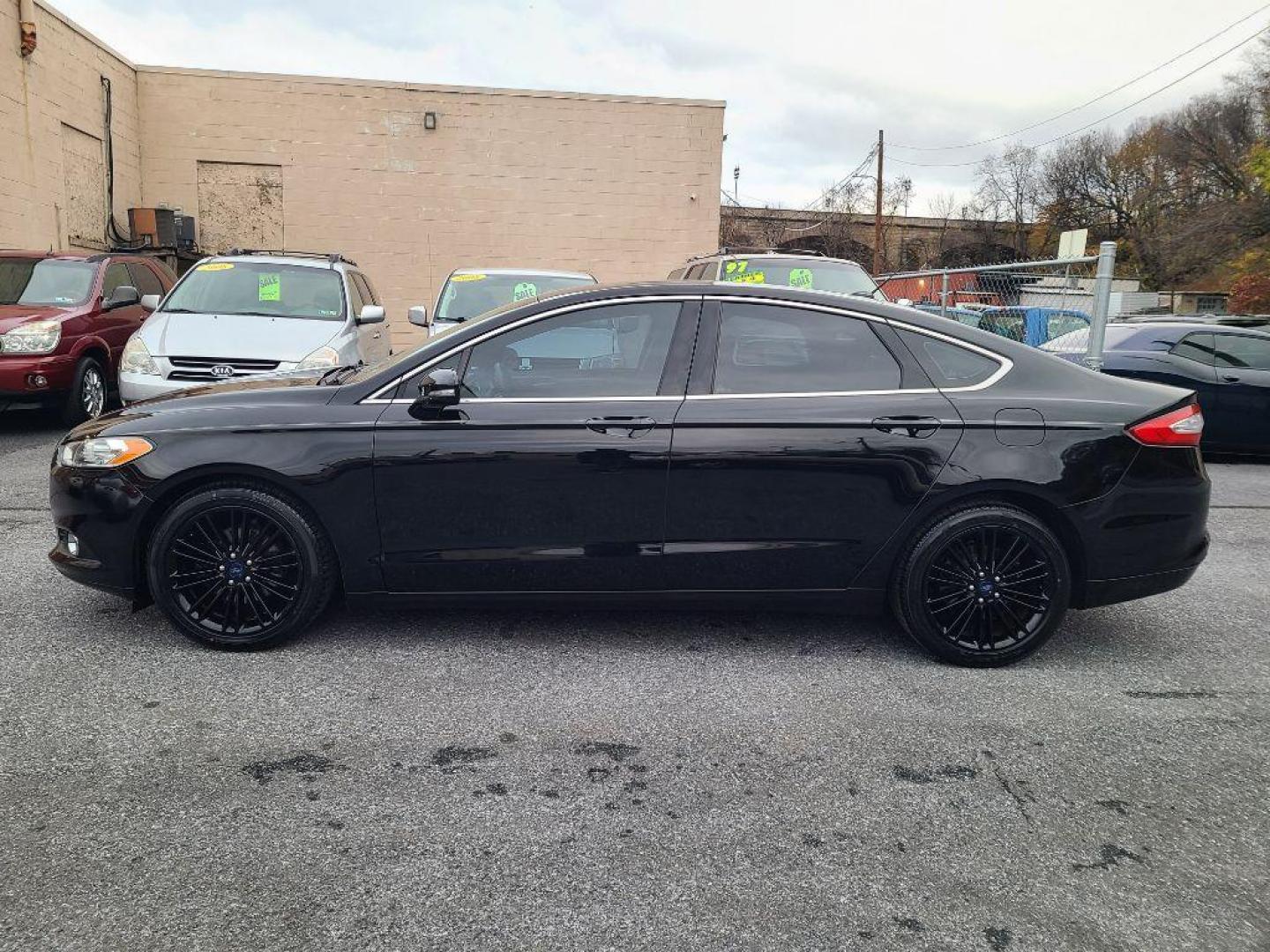 2016 BLACK FORD FUSION SE (3FA6P0HD2GR) with an 1.5L engine, Automatic transmission, located at 7981 Paxton Street, Harrisburg, PA, 17111, (717) 561-2926, 40.261490, -76.749229 - WE FINANCE!!! Good Credit/ Bad Credit/ No Credit - ALL Trade-Ins Welcomed!!! ***Guaranteed Credit Approval*** APPLY ONLINE or CALL us TODAY ;) Internet Prices and Marketplace Prices are SPECIAL discounted ***CASH DEALS*** Retail Prices are higher. Please call us to discuss your cash and finan - Photo#1