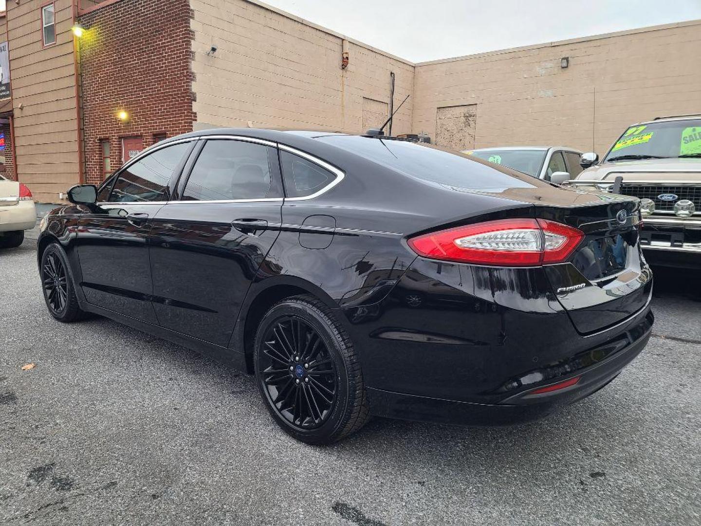 2016 BLACK FORD FUSION SE (3FA6P0HD2GR) with an 1.5L engine, Automatic transmission, located at 7981 Paxton Street, Harrisburg, PA, 17111, (717) 561-2926, 40.261490, -76.749229 - WE FINANCE!!! Good Credit/ Bad Credit/ No Credit - ALL Trade-Ins Welcomed!!! ***Guaranteed Credit Approval*** APPLY ONLINE or CALL us TODAY ;) Internet Prices and Marketplace Prices are SPECIAL discounted ***CASH DEALS*** Retail Prices are higher. Please call us to discuss your cash and finan - Photo#2