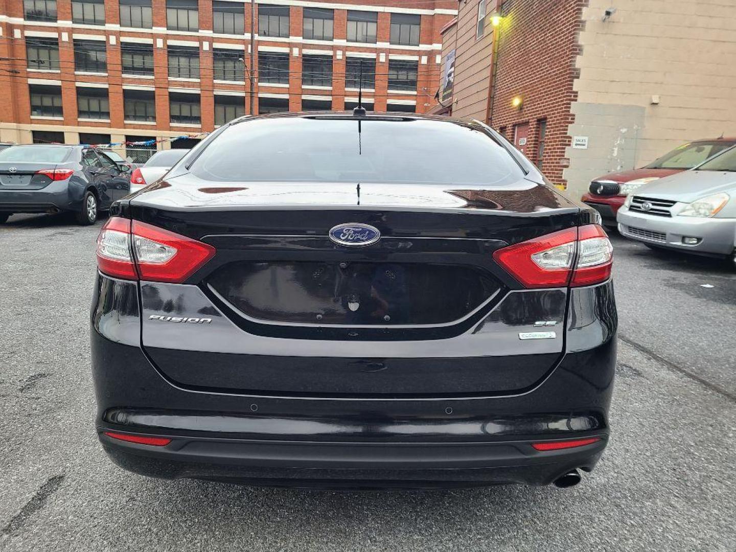 2016 BLACK FORD FUSION SE (3FA6P0HD2GR) with an 1.5L engine, Automatic transmission, located at 7981 Paxton Street, Harrisburg, PA, 17111, (717) 561-2926, 40.261490, -76.749229 - WE FINANCE!!! Good Credit/ Bad Credit/ No Credit - ALL Trade-Ins Welcomed!!! ***Guaranteed Credit Approval*** APPLY ONLINE or CALL us TODAY ;) Internet Prices and Marketplace Prices are SPECIAL discounted ***CASH DEALS*** Retail Prices are higher. Please call us to discuss your cash and finan - Photo#3