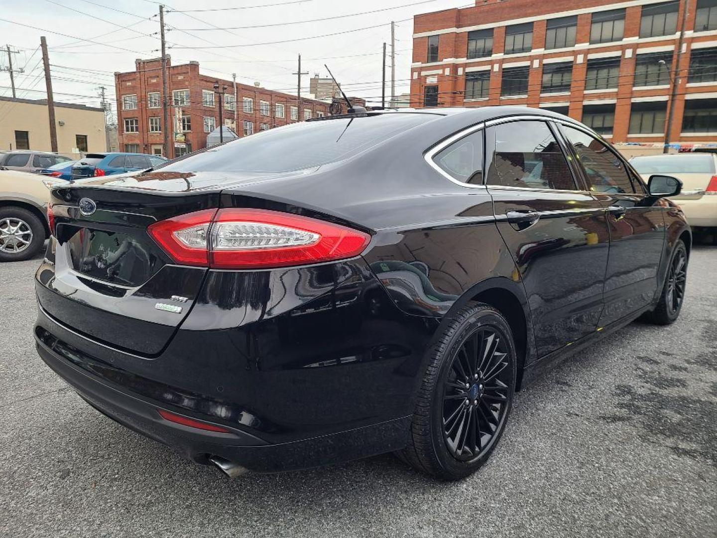 2016 BLACK FORD FUSION SE (3FA6P0HD2GR) with an 1.5L engine, Automatic transmission, located at 7981 Paxton Street, Harrisburg, PA, 17111, (717) 561-2926, 40.261490, -76.749229 - WE FINANCE!!! Good Credit/ Bad Credit/ No Credit - ALL Trade-Ins Welcomed!!! ***Guaranteed Credit Approval*** APPLY ONLINE or CALL us TODAY ;) Internet Prices and Marketplace Prices are SPECIAL discounted ***CASH DEALS*** Retail Prices are higher. Please call us to discuss your cash and finan - Photo#4