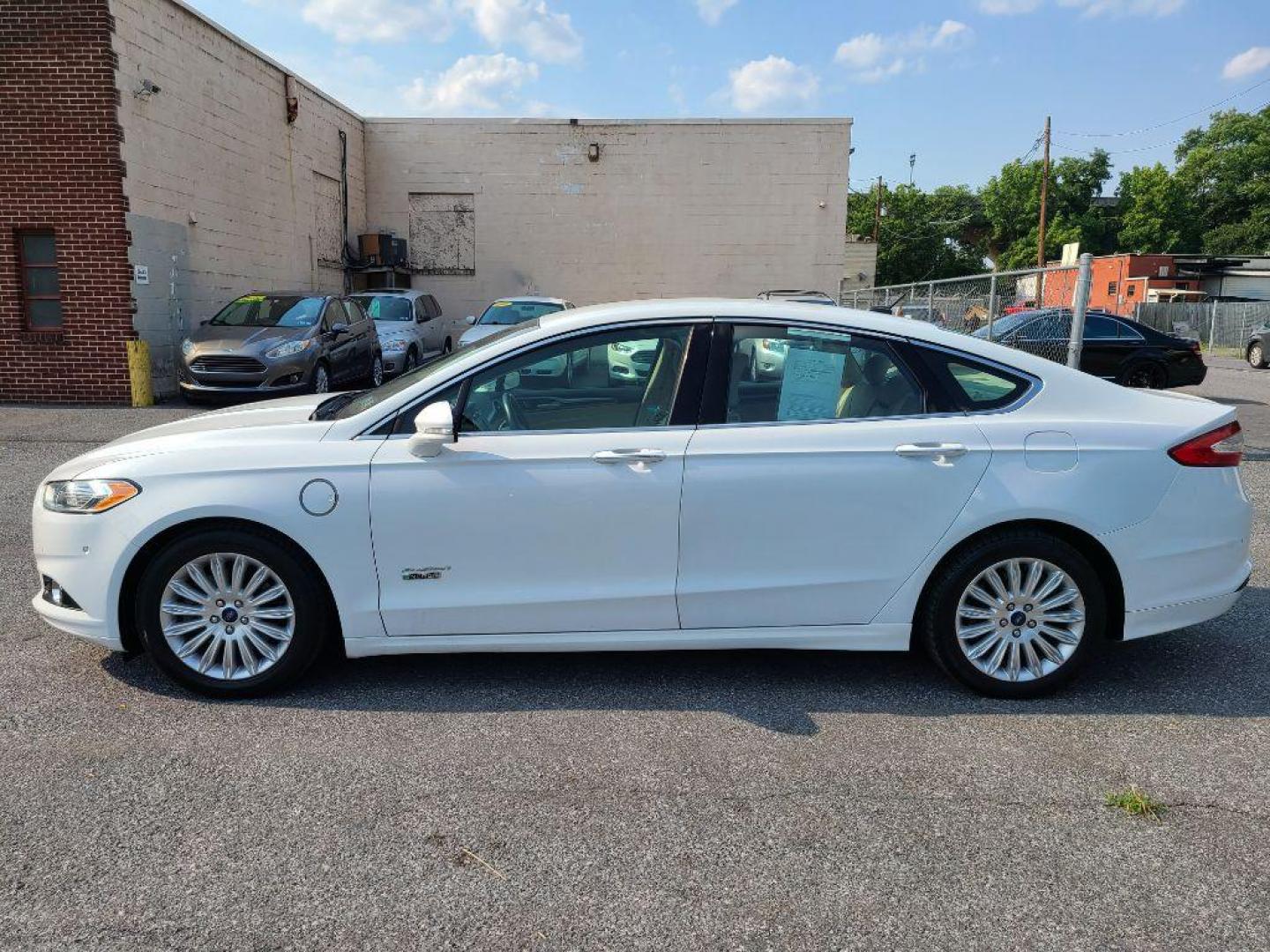 2016 WHITE FORD FUSION SE PHEV (3FA6P0PU6GR) with an 2.0L engine, Continuously Variable transmission, located at 7981 Paxton Street, Harrisburg, PA, 17111, (717) 561-2926, 40.261490, -76.749229 - WE FINANCE!!! Good Credit/ Bad Credit/ No Credit - ALL Trade-Ins Welcomed!!! ***Guaranteed Credit Approval*** APPLY ONLINE or CALL us TODAY ;) Internet Prices and Marketplace Prices are SPECIAL discounted ***CASH DEALS*** Retail Prices are higher. Please call us to discuss your cash and finan - Photo#1