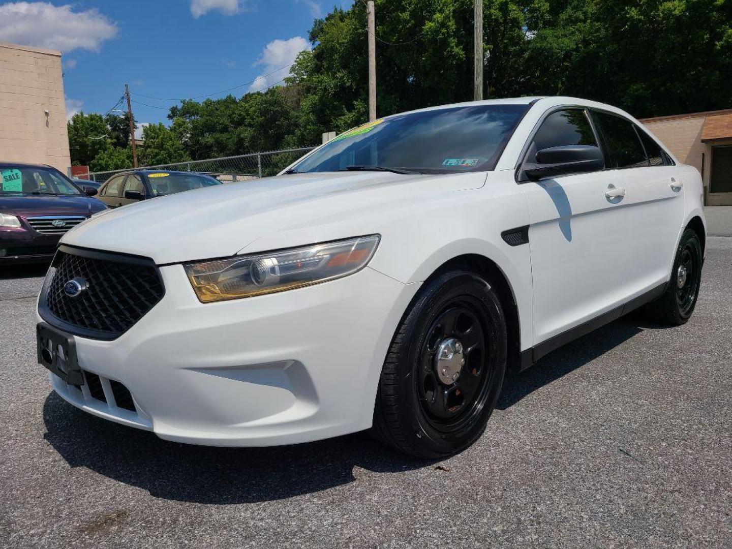 2016 WHITE FORD TAURUS POLICE INTERCEPTOR (1FAHP2MK4GG) with an 3.7L engine, Automatic transmission, located at 117 North Cameron Street, Harrisburg, PA, 17101, (717) 963-8962, 40.266762, -76.875259 - WE FINANCE!!! Good Credit/ Bad Credit/ No Credit - ALL Trade-Ins Welcomed!!! ***Guaranteed Credit Approval*** APPLY ONLINE or CALL us TODAY ;) Internet Prices and Marketplace Prices are SPECIAL discounted ***CASH DEALS*** Retail Prices are higher. Please call us to discuss your cash and finan - Photo#0