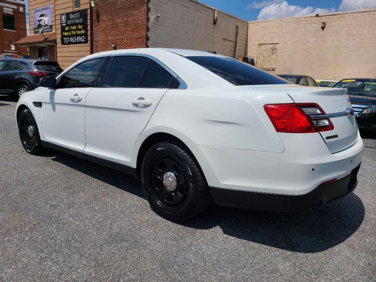 2016 WHITE FORD TAURUS POLICE INTERCEPTOR (1FAHP2MK4GG) with an 3.7L engine, Automatic transmission, located at 117 North Cameron Street, Harrisburg, PA, 17101, (717) 963-8962, 40.266762, -76.875259 - WE FINANCE!!! Good Credit/ Bad Credit/ No Credit - ALL Trade-Ins Welcomed!!! ***Guaranteed Credit Approval*** APPLY ONLINE or CALL us TODAY ;) Internet Prices and Marketplace Prices are SPECIAL discounted ***CASH DEALS*** Retail Prices are higher. Please call us to discuss your cash and finan - Photo#2