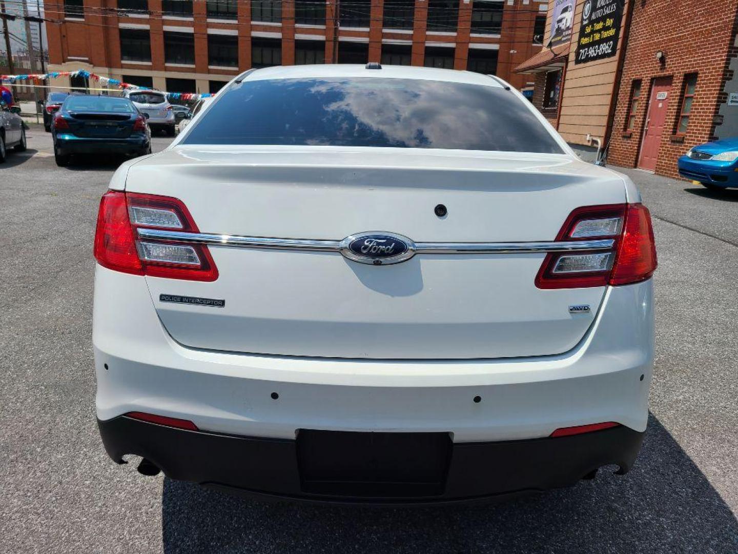 2016 WHITE FORD TAURUS POLICE INTERCEPTOR (1FAHP2MK4GG) with an 3.7L engine, Automatic transmission, located at 117 North Cameron Street, Harrisburg, PA, 17101, (717) 963-8962, 40.266762, -76.875259 - WE FINANCE!!! Good Credit/ Bad Credit/ No Credit - ALL Trade-Ins Welcomed!!! ***Guaranteed Credit Approval*** APPLY ONLINE or CALL us TODAY ;) Internet Prices and Marketplace Prices are SPECIAL discounted ***CASH DEALS*** Retail Prices are higher. Please call us to discuss your cash and finan - Photo#3