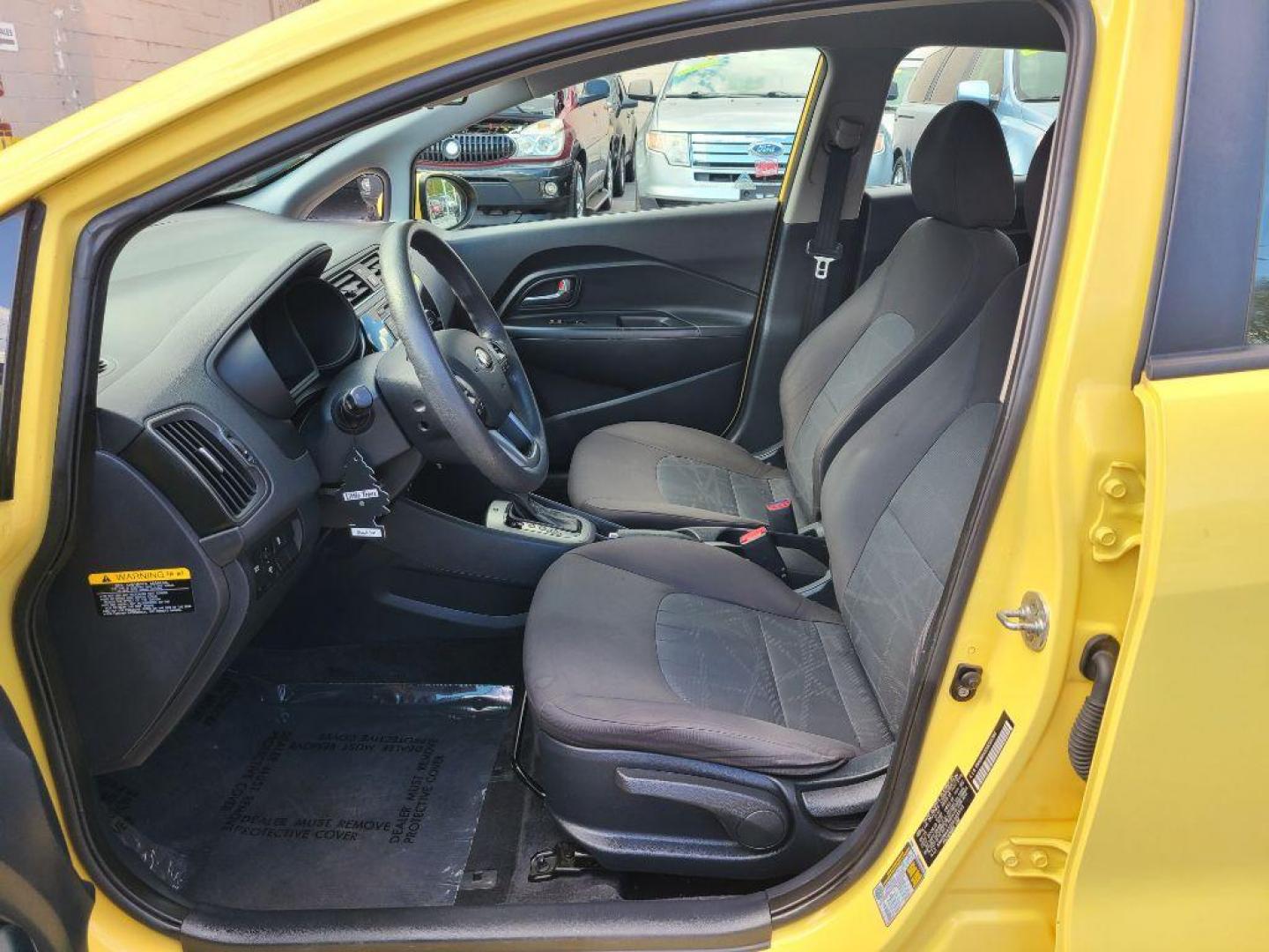 2016 YELLOW KIA RIO LX (KNADM4A32G6) with an 1.6L engine, 6-Speed Manual transmission, located at 117 North Cameron Street, Harrisburg, PA, 17101, (717) 963-8962, 40.266762, -76.875259 - WE FINANCE!!! Good Credit/ Bad Credit/ No Credit - ALL Trade-Ins Welcomed!!! ***Guaranteed Credit Approval*** APPLY ONLINE or CALL us TODAY ;) Internet Prices and Marketplace Prices are SPECIAL discounted ***CASH DEALS*** Retail Prices are higher. Please call us to discuss your cash and finan - Photo#12