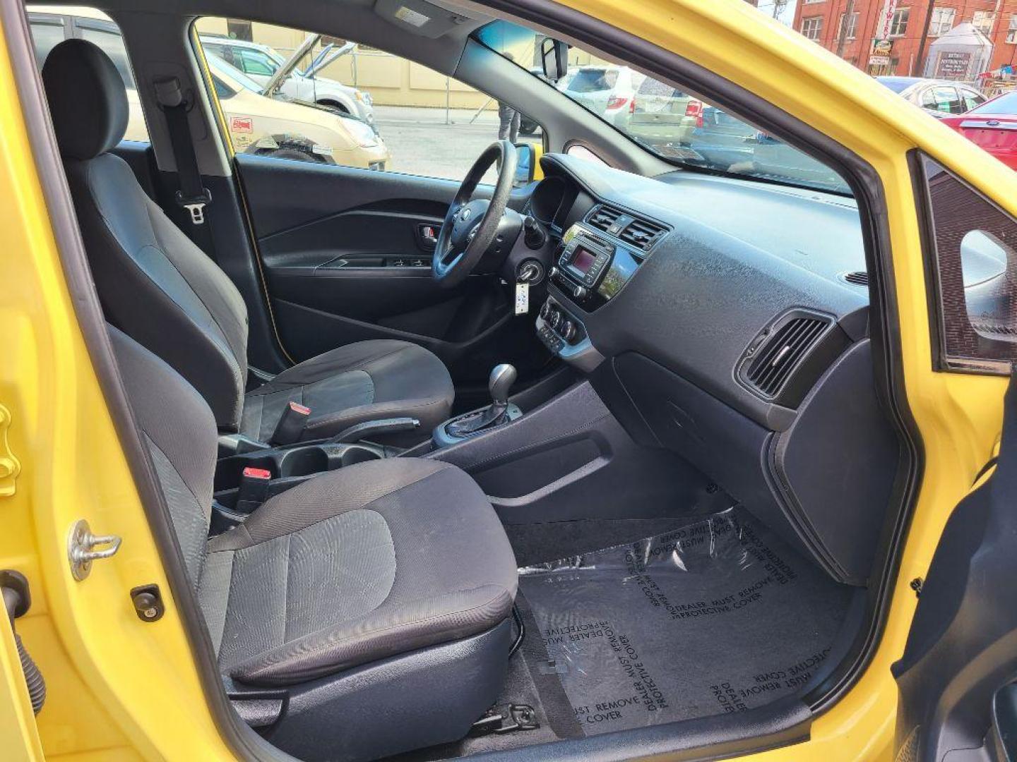 2016 YELLOW KIA RIO LX (KNADM4A32G6) with an 1.6L engine, 6-Speed Manual transmission, located at 117 North Cameron Street, Harrisburg, PA, 17101, (717) 963-8962, 40.266762, -76.875259 - WE FINANCE!!! Good Credit/ Bad Credit/ No Credit - ALL Trade-Ins Welcomed!!! ***Guaranteed Credit Approval*** APPLY ONLINE or CALL us TODAY ;) Internet Prices and Marketplace Prices are SPECIAL discounted ***CASH DEALS*** Retail Prices are higher. Please call us to discuss your cash and finan - Photo#8