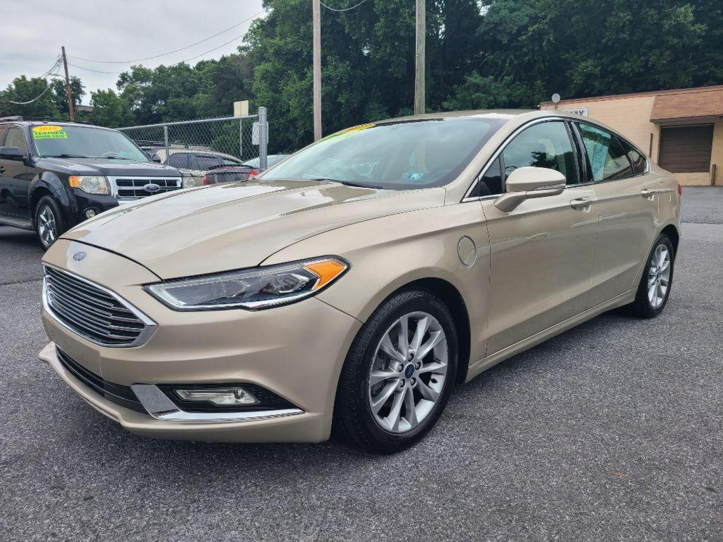 2017 TAN FORD FUSION SE PHEV (3FA6P0PU2HR) with an 2.0L engine, Continuously Variable transmission, located at 117 North Cameron Street, Harrisburg, PA, 17101, (717) 963-8962, 40.266762, -76.875259 - WE FINANCE!!! Good Credit/ Bad Credit/ No Credit - ALL Trade-Ins Welcomed!!! ***Guaranteed Credit Approval*** APPLY ONLINE or CALL us TODAY ;) Internet Prices and Marketplace Prices are SPECIAL discounted ***CASH DEALS*** Retail Prices are higher. Please call us to discuss your cash and finan - Photo#0