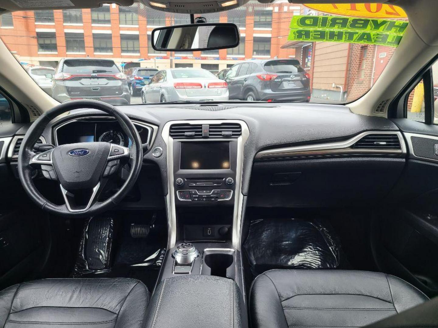 2017 TAN FORD FUSION SE PHEV (3FA6P0PU2HR) with an 2.0L engine, Continuously Variable transmission, located at 117 North Cameron Street, Harrisburg, PA, 17101, (717) 963-8962, 40.266762, -76.875259 - WE FINANCE!!! Good Credit/ Bad Credit/ No Credit - ALL Trade-Ins Welcomed!!! ***Guaranteed Credit Approval*** APPLY ONLINE or CALL us TODAY ;) Internet Prices and Marketplace Prices are SPECIAL discounted ***CASH DEALS*** Retail Prices are higher. Please call us to discuss your cash and finan - Photo#9