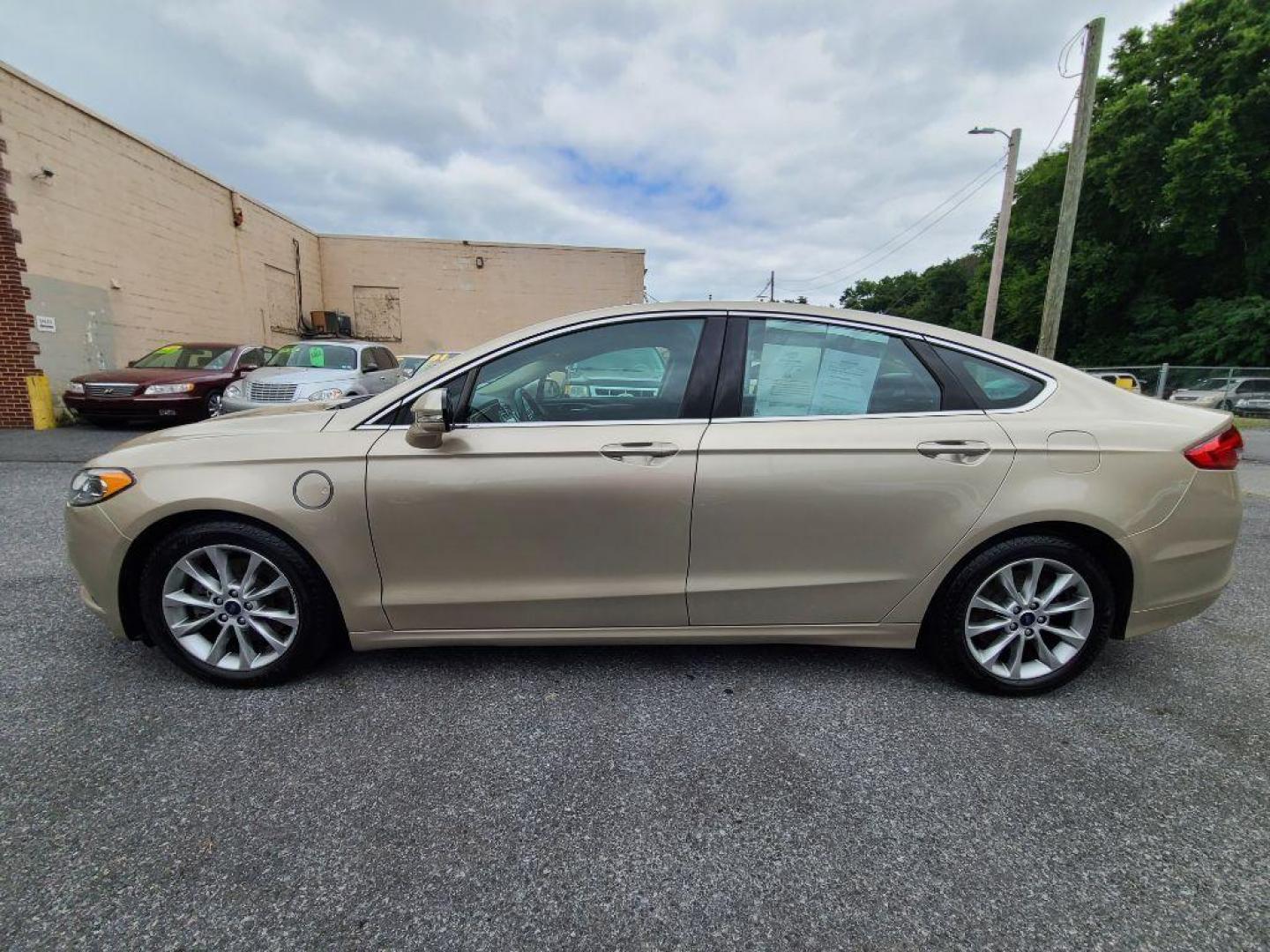 2017 TAN FORD FUSION SE PHEV (3FA6P0PU2HR) with an 2.0L engine, Continuously Variable transmission, located at 117 North Cameron Street, Harrisburg, PA, 17101, (717) 963-8962, 40.266762, -76.875259 - WE FINANCE!!! Good Credit/ Bad Credit/ No Credit - ALL Trade-Ins Welcomed!!! ***Guaranteed Credit Approval*** APPLY ONLINE or CALL us TODAY ;) Internet Prices and Marketplace Prices are SPECIAL discounted ***CASH DEALS*** Retail Prices are higher. Please call us to discuss your cash and finan - Photo#1