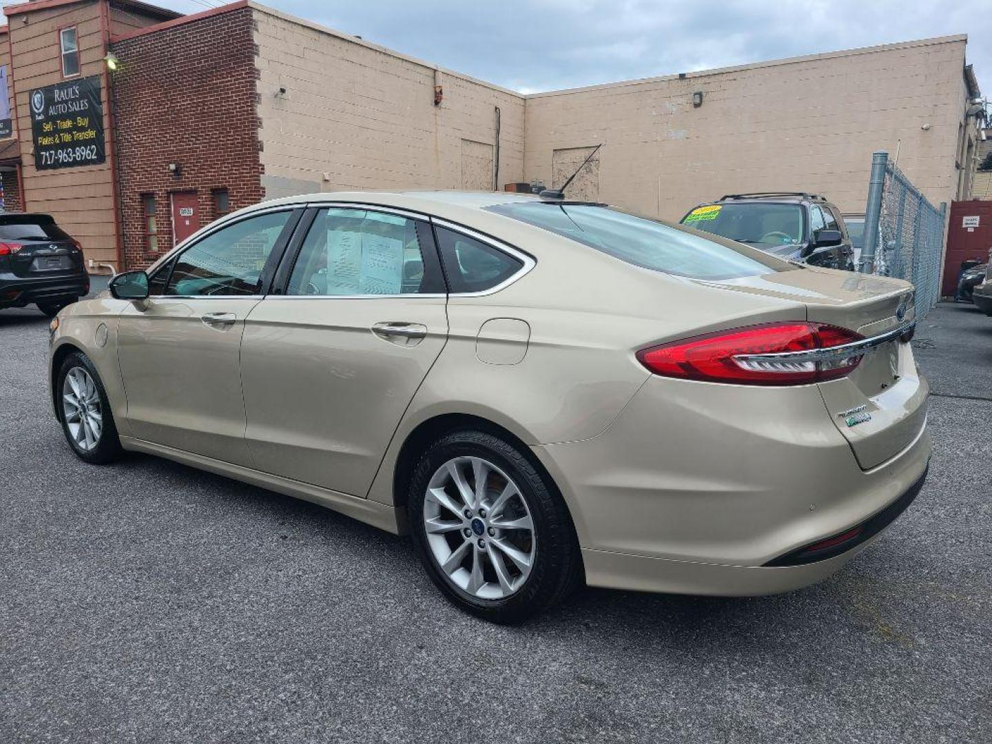 2017 TAN FORD FUSION SE PHEV (3FA6P0PU2HR) with an 2.0L engine, Continuously Variable transmission, located at 117 North Cameron Street, Harrisburg, PA, 17101, (717) 963-8962, 40.266762, -76.875259 - WE FINANCE!!! Good Credit/ Bad Credit/ No Credit - ALL Trade-Ins Welcomed!!! ***Guaranteed Credit Approval*** APPLY ONLINE or CALL us TODAY ;) Internet Prices and Marketplace Prices are SPECIAL discounted ***CASH DEALS*** Retail Prices are higher. Please call us to discuss your cash and finan - Photo#2