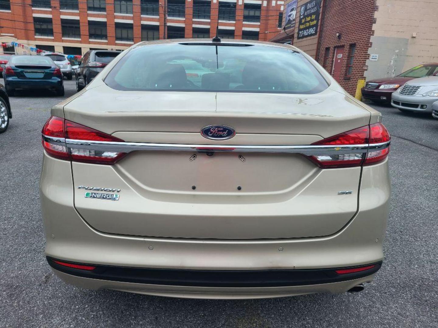 2017 TAN FORD FUSION SE PHEV (3FA6P0PU2HR) with an 2.0L engine, Continuously Variable transmission, located at 117 North Cameron Street, Harrisburg, PA, 17101, (717) 963-8962, 40.266762, -76.875259 - WE FINANCE!!! Good Credit/ Bad Credit/ No Credit - ALL Trade-Ins Welcomed!!! ***Guaranteed Credit Approval*** APPLY ONLINE or CALL us TODAY ;) Internet Prices and Marketplace Prices are SPECIAL discounted ***CASH DEALS*** Retail Prices are higher. Please call us to discuss your cash and finan - Photo#3