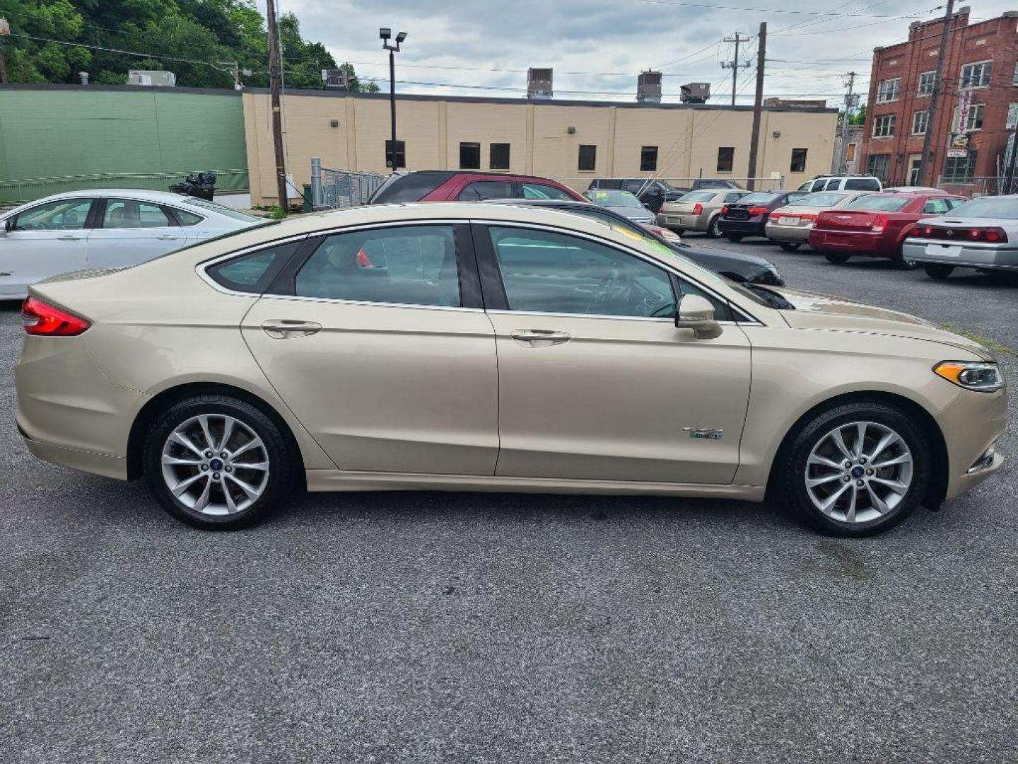 2017 TAN FORD FUSION SE PHEV (3FA6P0PU2HR) with an 2.0L engine, Continuously Variable transmission, located at 117 North Cameron Street, Harrisburg, PA, 17101, (717) 963-8962, 40.266762, -76.875259 - WE FINANCE!!! Good Credit/ Bad Credit/ No Credit - ALL Trade-Ins Welcomed!!! ***Guaranteed Credit Approval*** APPLY ONLINE or CALL us TODAY ;) Internet Prices and Marketplace Prices are SPECIAL discounted ***CASH DEALS*** Retail Prices are higher. Please call us to discuss your cash and finan - Photo#5