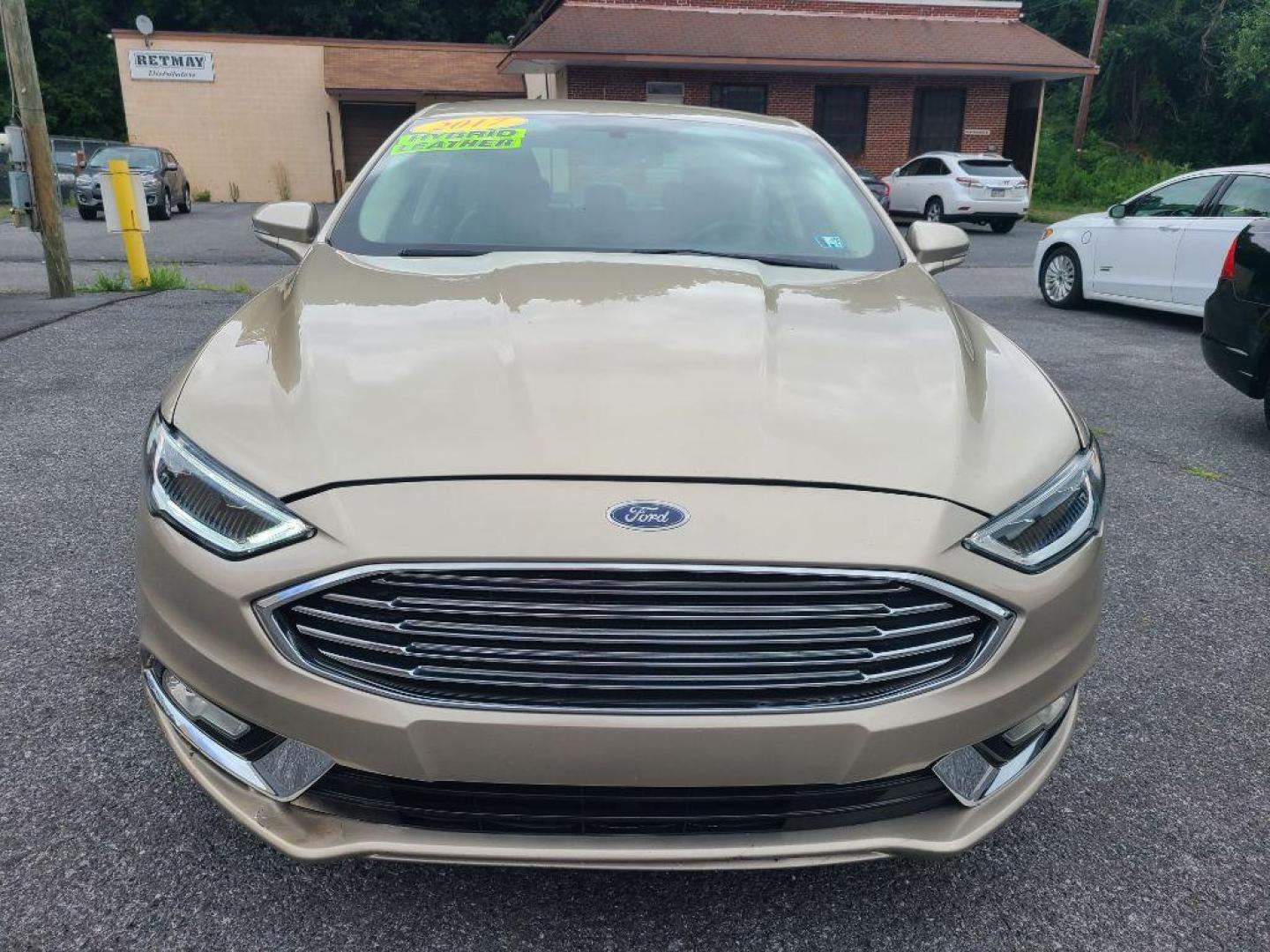 2017 TAN FORD FUSION SE PHEV (3FA6P0PU2HR) with an 2.0L engine, Continuously Variable transmission, located at 117 North Cameron Street, Harrisburg, PA, 17101, (717) 963-8962, 40.266762, -76.875259 - WE FINANCE!!! Good Credit/ Bad Credit/ No Credit - ALL Trade-Ins Welcomed!!! ***Guaranteed Credit Approval*** APPLY ONLINE or CALL us TODAY ;) Internet Prices and Marketplace Prices are SPECIAL discounted ***CASH DEALS*** Retail Prices are higher. Please call us to discuss your cash and finan - Photo#7