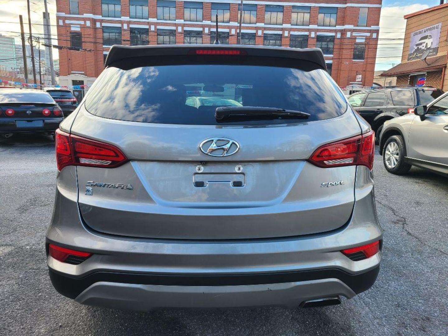 2018 GRAY HYUNDAI SANTA FE SPORT SPORT (5NMZT3LB4JH) with an 2.4L engine, Automatic transmission, located at 7981 Paxton Street, Harrisburg, PA, 17111, (717) 561-2926, 40.261490, -76.749229 - WE FINANCE!!! Good Credit/ Bad Credit/ No Credit - ALL Trade-Ins Welcomed!!! ***Guaranteed Credit Approval*** APPLY ONLINE or CALL us TODAY ;) Internet Prices and Marketplace Prices are SPECIAL discounted ***CASH DEALS*** Retail Prices are higher. Please call us to discuss your cash and finan - Photo#3